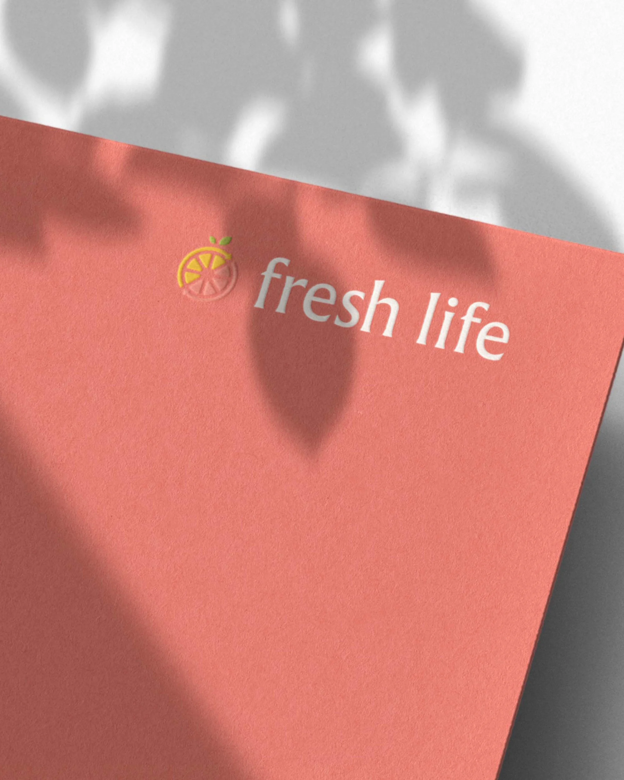 Fresh Life logo embossed on cardstock