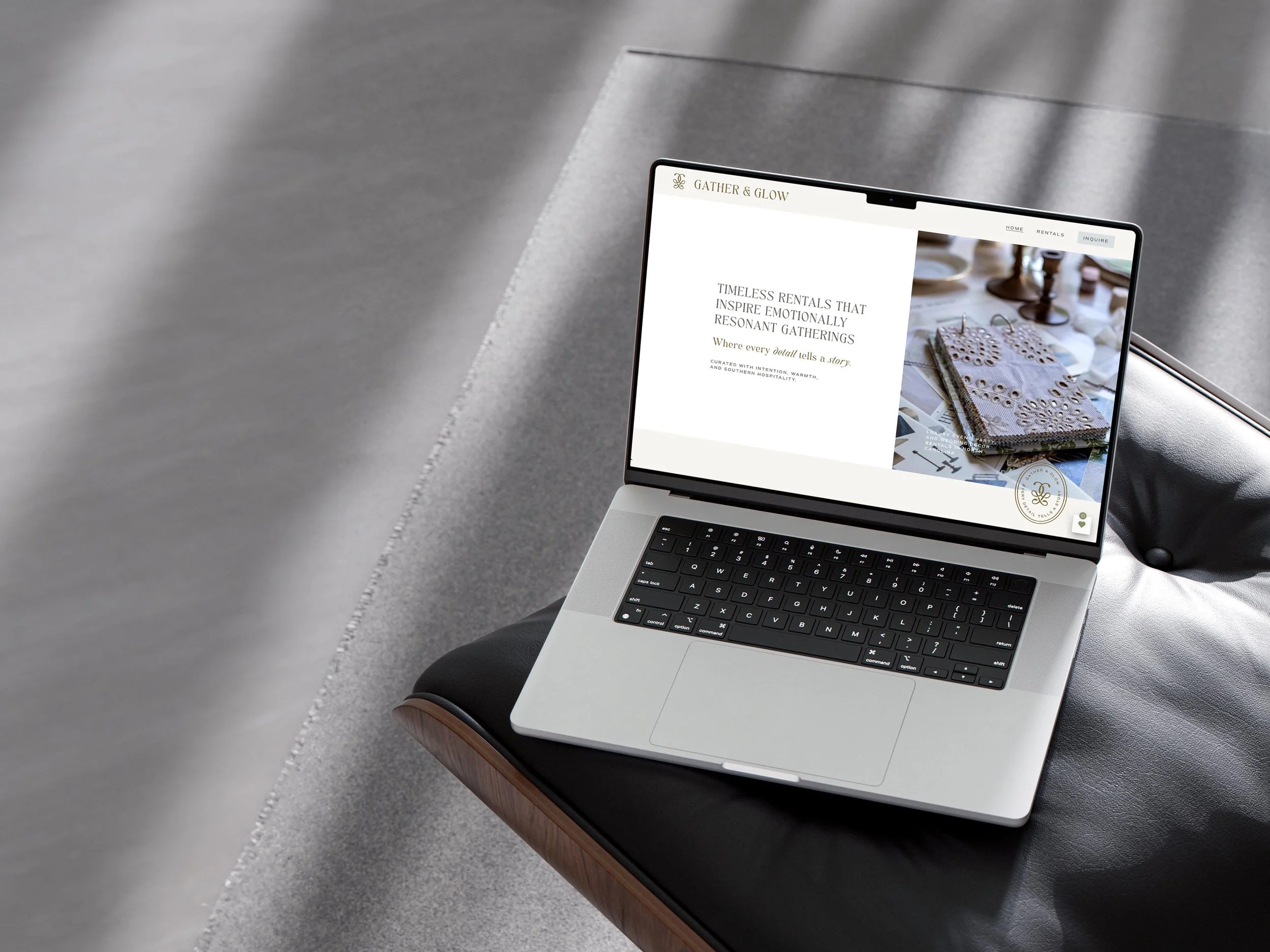 laptop displaying homepage of Gather & Glow Event Rentals website