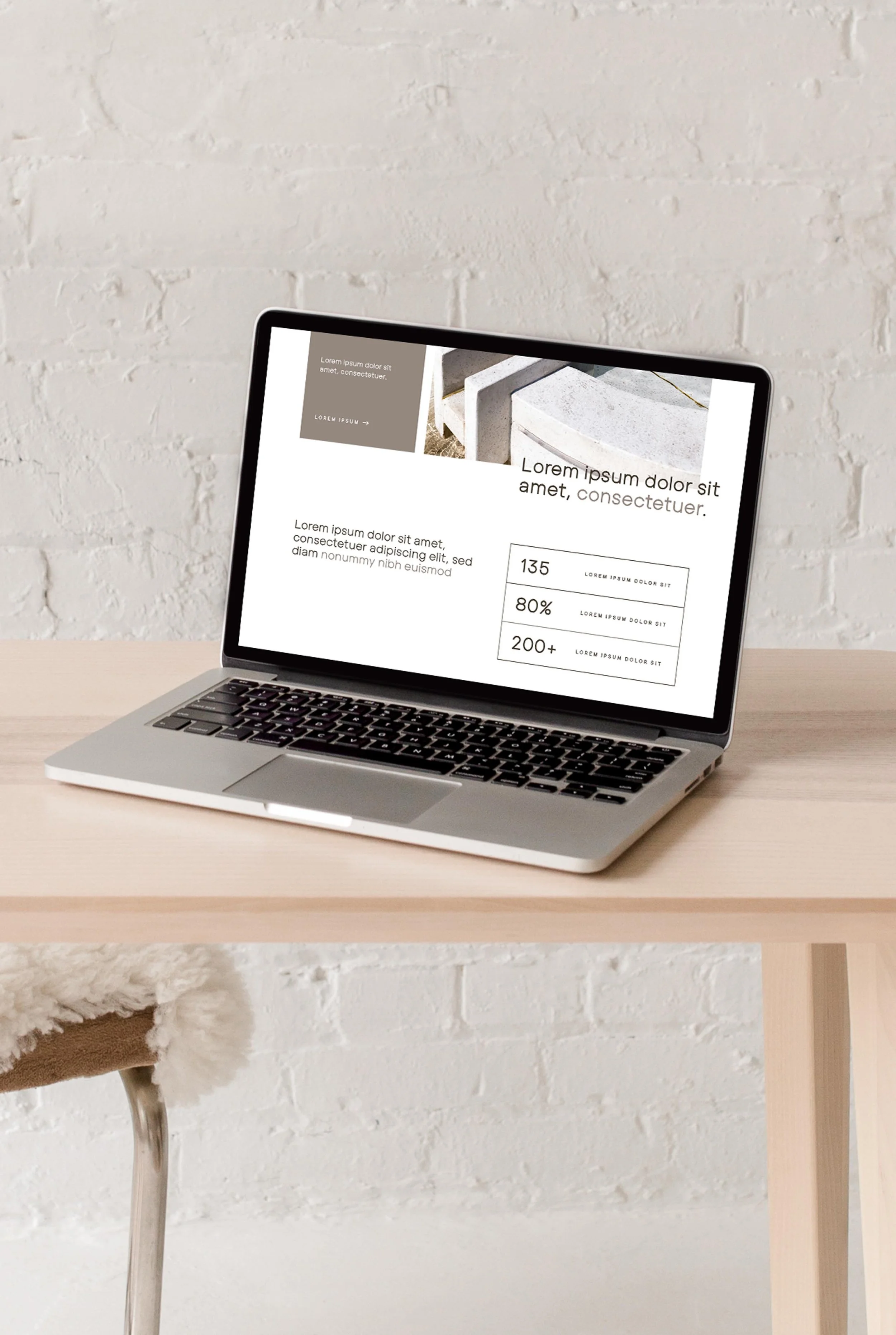 laptop displaying the statistics section of The Blair website design