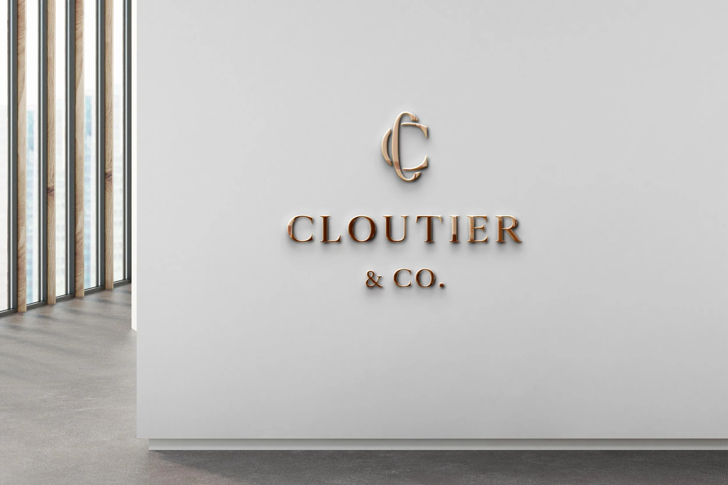Cloutier & Co. metal wall sign