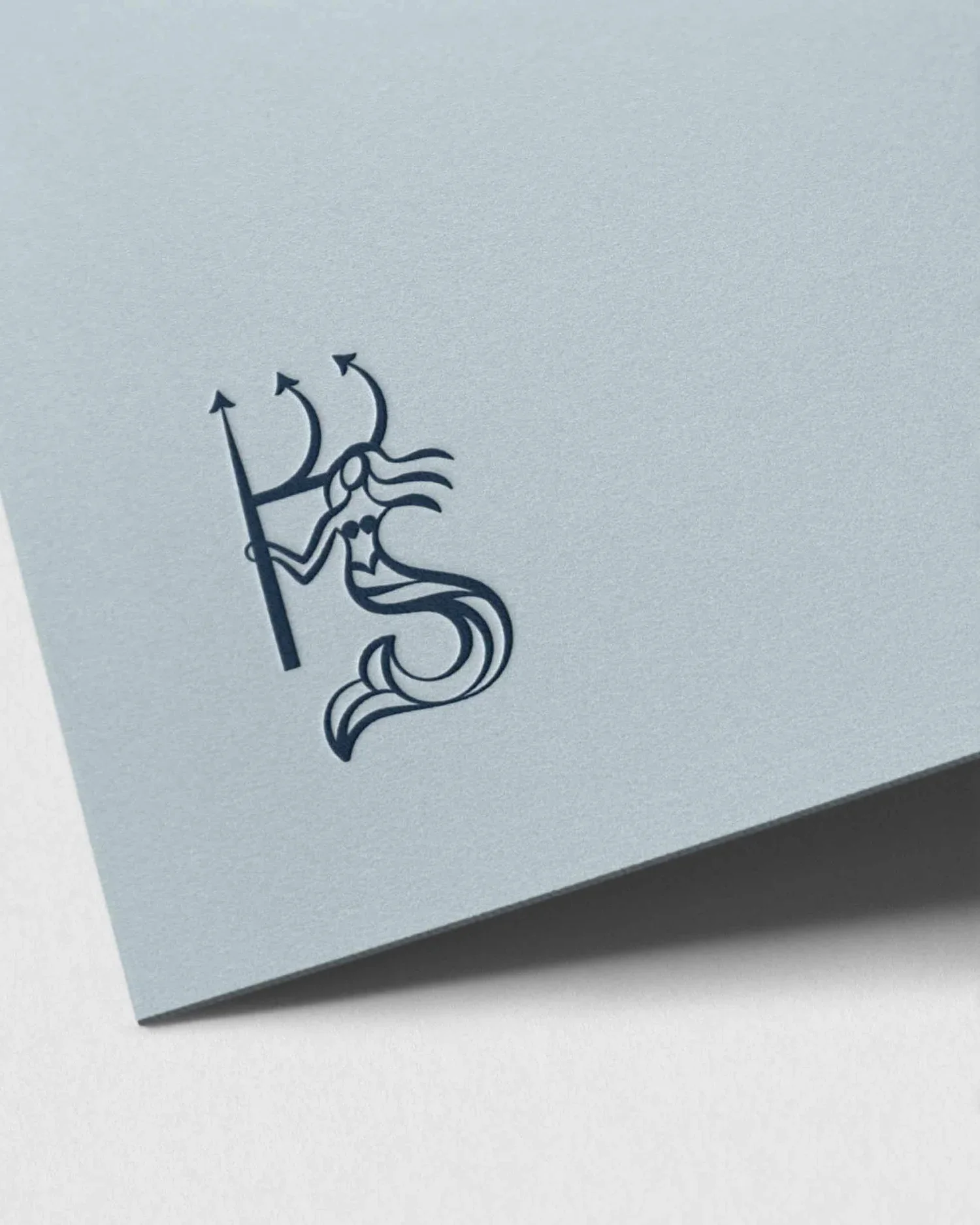 Pink Sand icon embossed on stationery