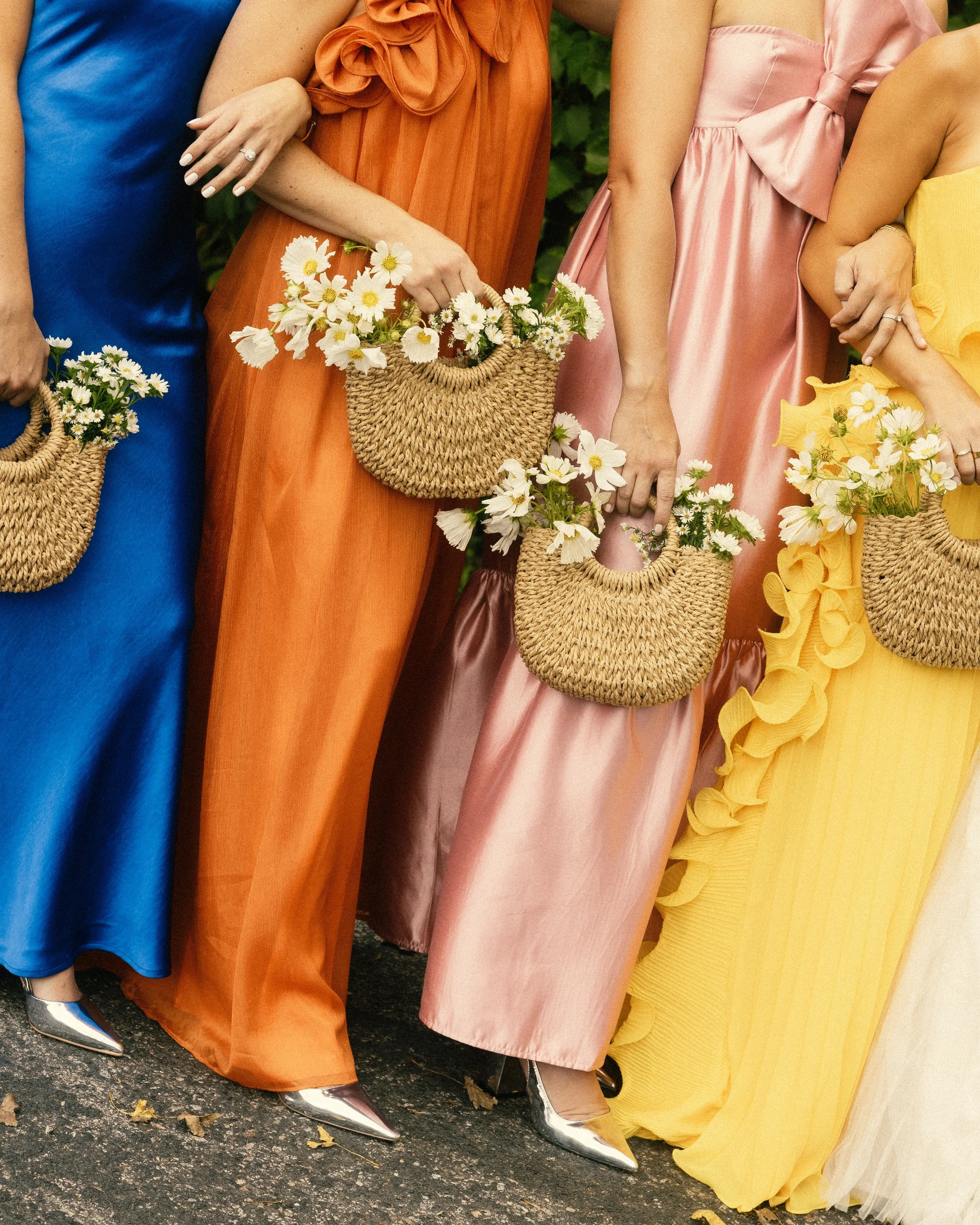 colorful-mismatched-bridesmaids-dresses-urban-daisy-wedding-minneapolis.jpg