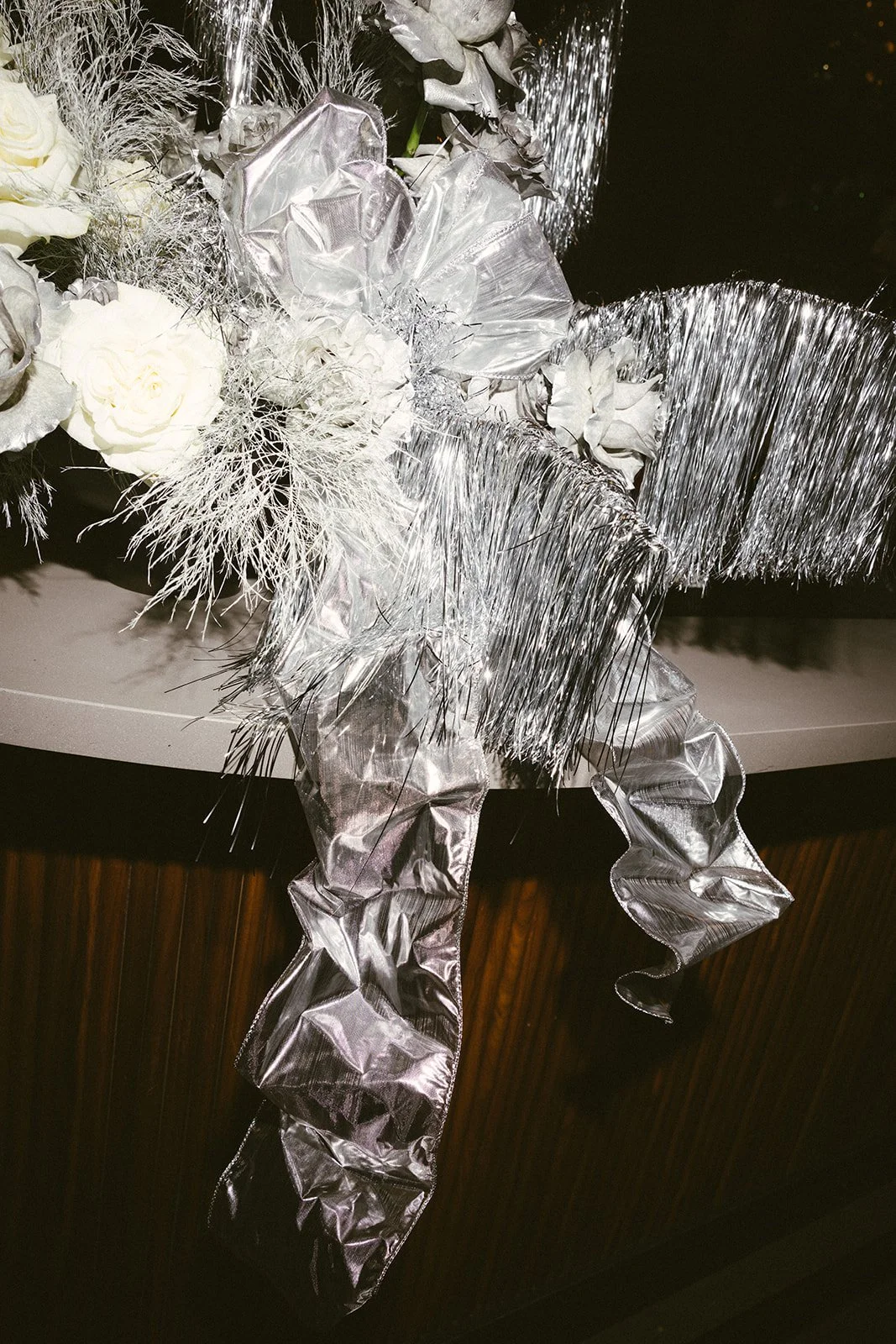 Sculptural silver bow centerpiece Apricot Floral