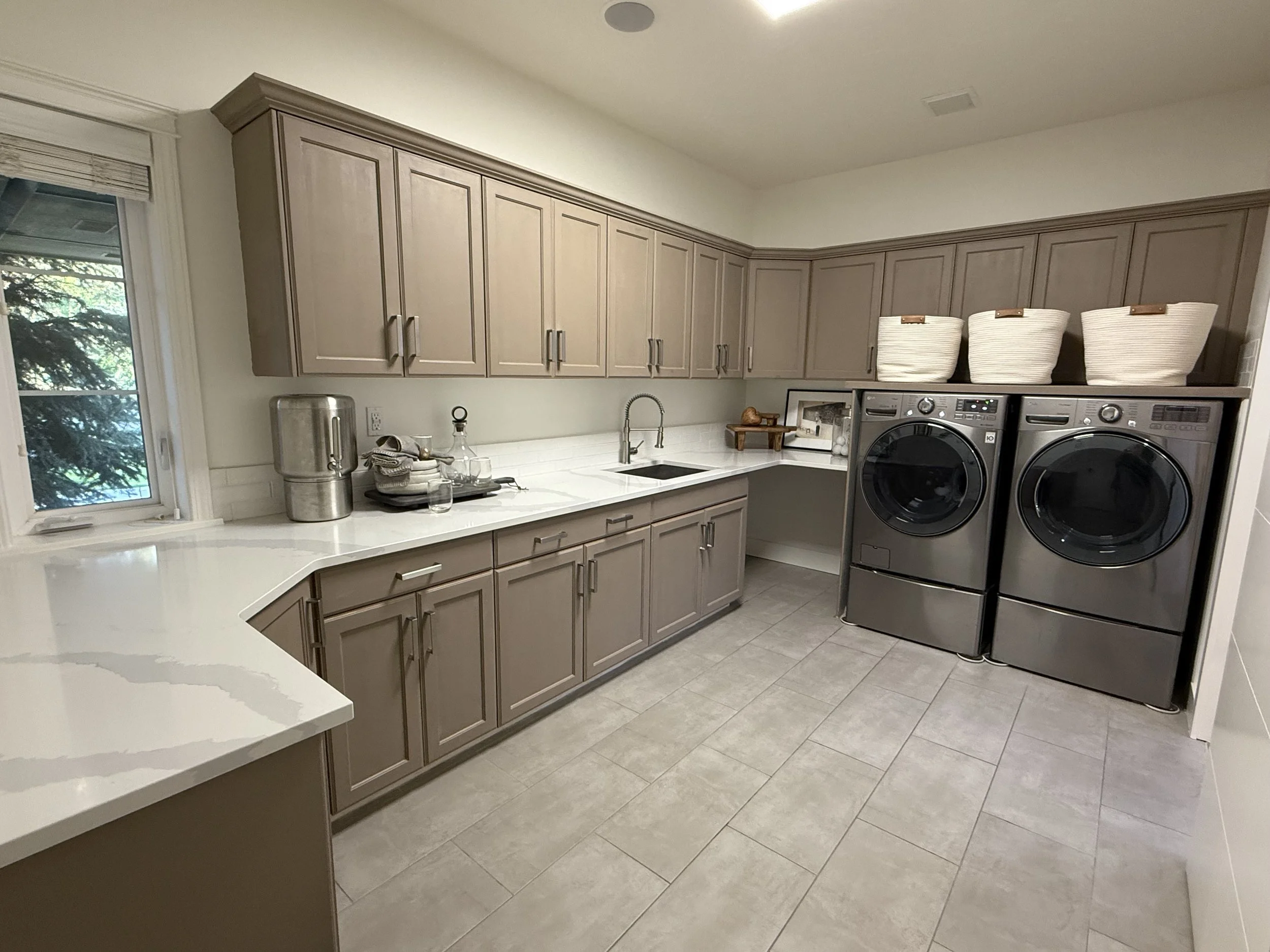 Massive Laundry Room with Utility Sink and Ample Storage