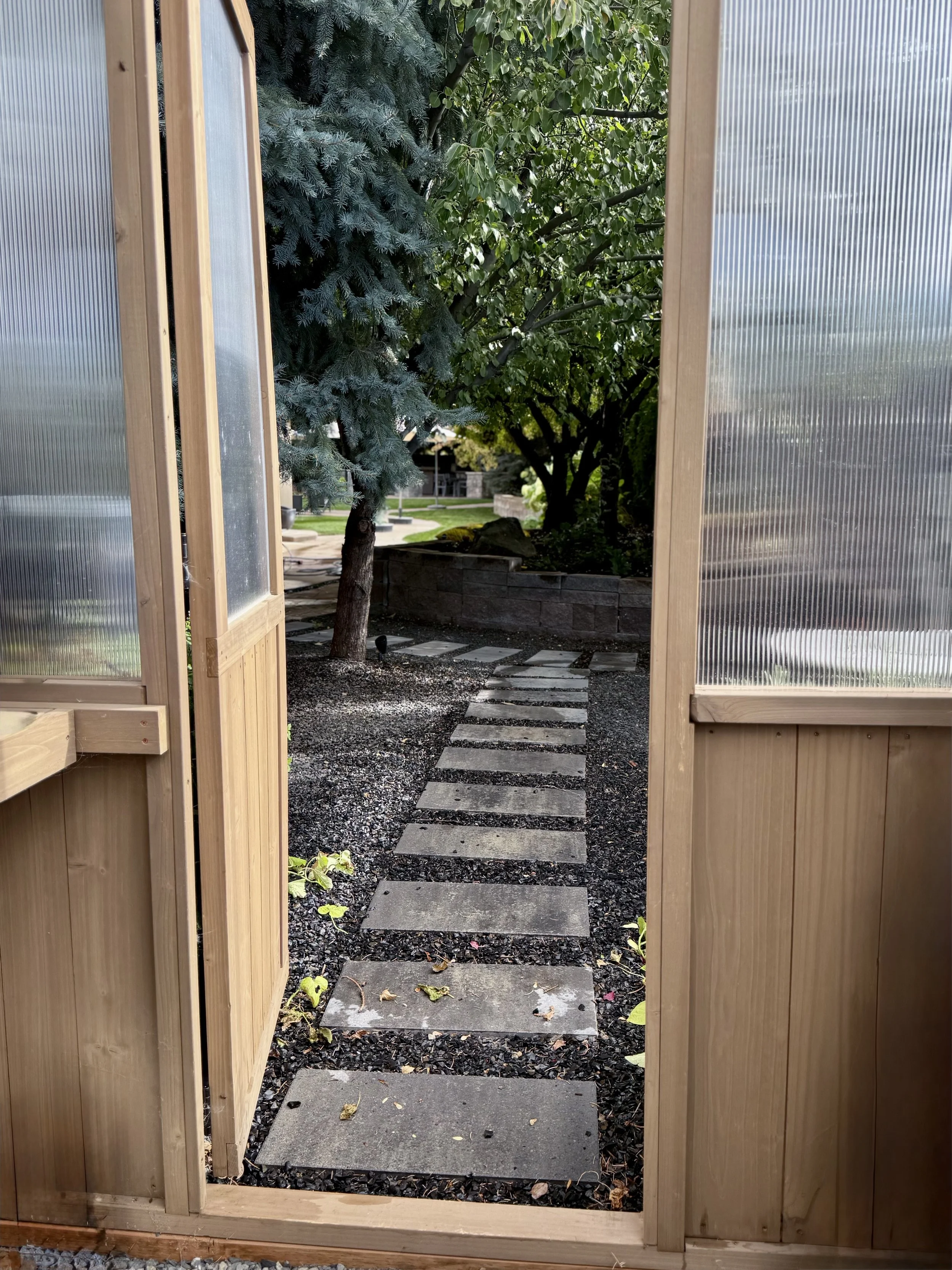 Garden with Green House to Extend Growing Season