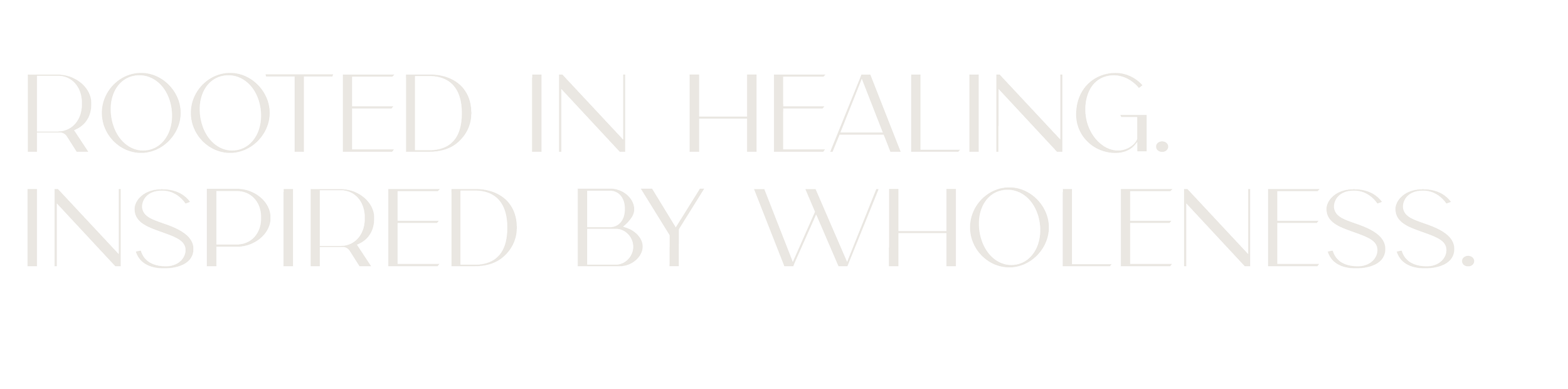 Inspirational quote in light gray text on a black background: 'Rooted in healing, inspired by wholeness.'