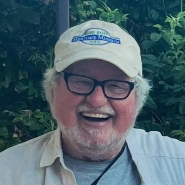 Photo of Vashon Heritage Museum board member, Cyrus Anderson, in baseball cap.