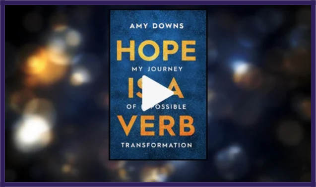 Book cover titled 'Hope is a Verb' by Amy Downs, with a play button over it, indicating a video or audiobook.