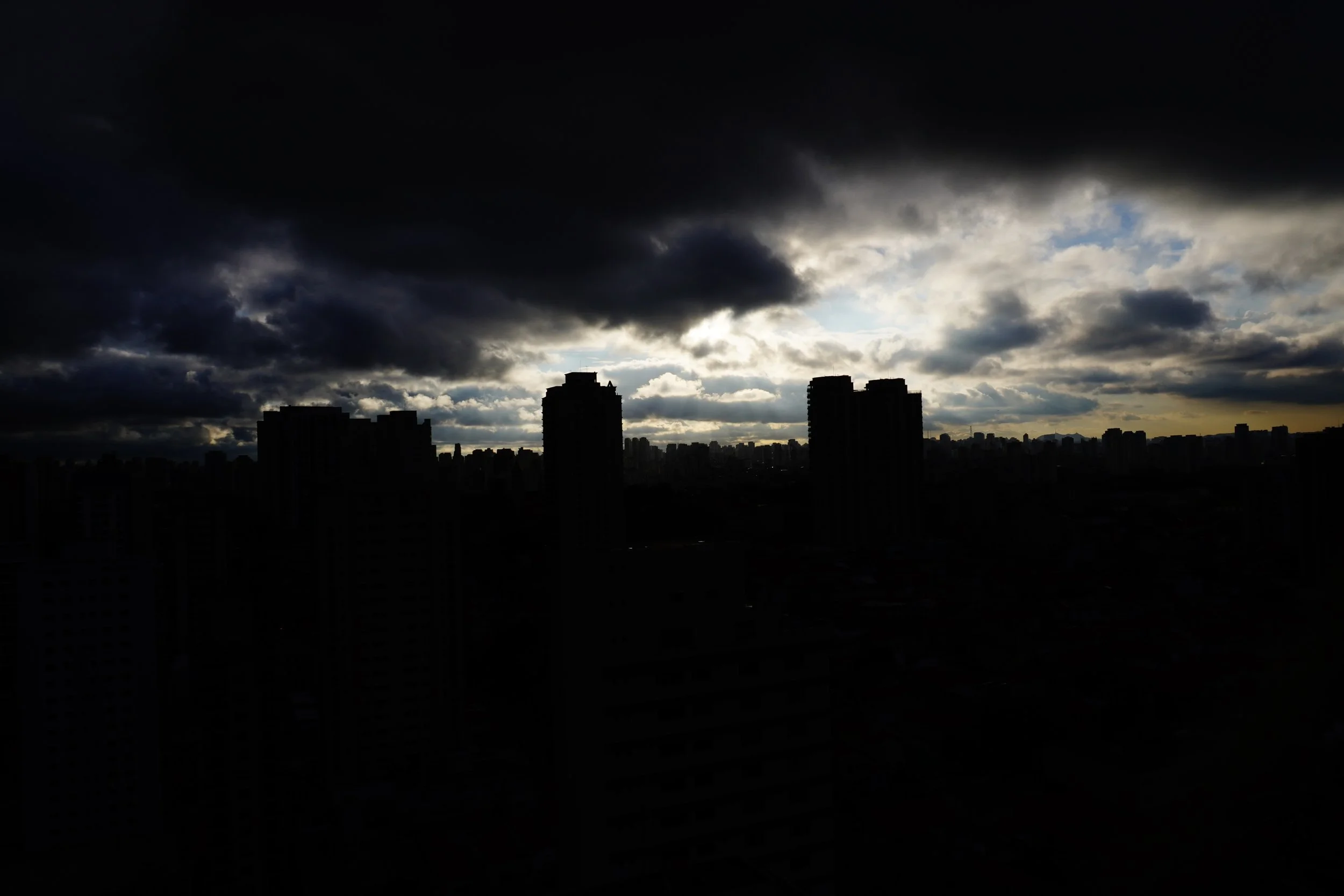 Dark silhouettes, a promise of light.