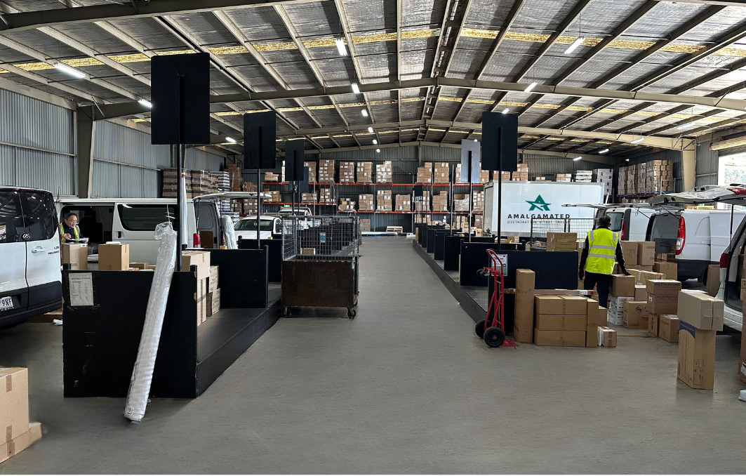 Amalgamated Clayton distribution warehouse team sorting freight