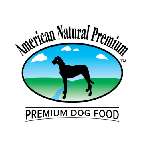 Logo with a black dog silhouette standing on green grass in front of a blue sky with white clouds, enclosed in a black oval. Text reads 'American Natural Premium' above and 'Premium Dog Food' below.