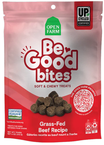 Bag of Be Good Bites grass-fed beef dog treats with a pink background, green 'Open Farm' logo, red 'UP CYCLE' badge, and a QR code.