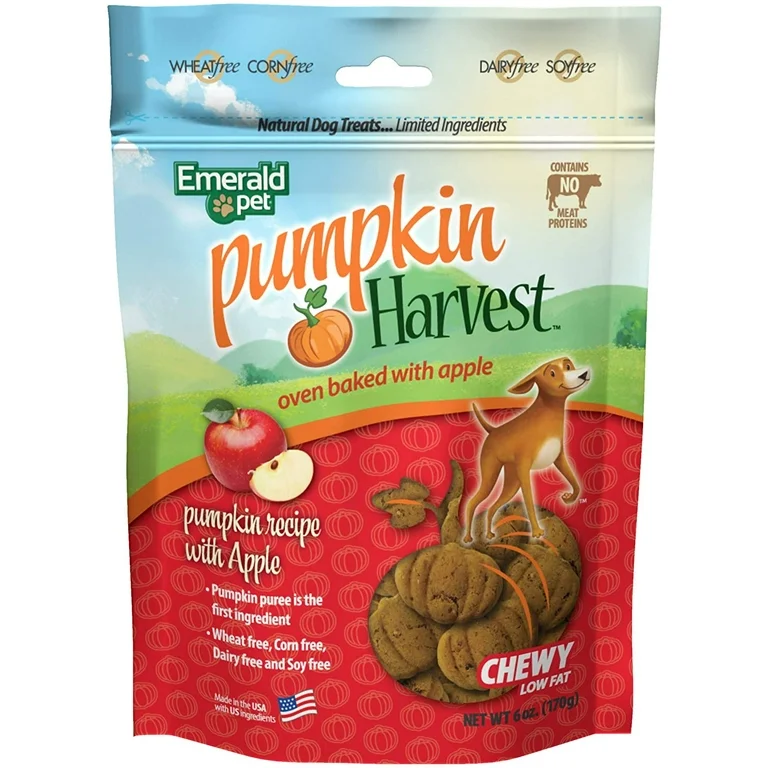 Package of Emerald Pet Pumpkin Harvest dog treats, oven baked with apple. The package features a dog, pumpkins, an apple, and cookies, indicating the flavor and ingredients.