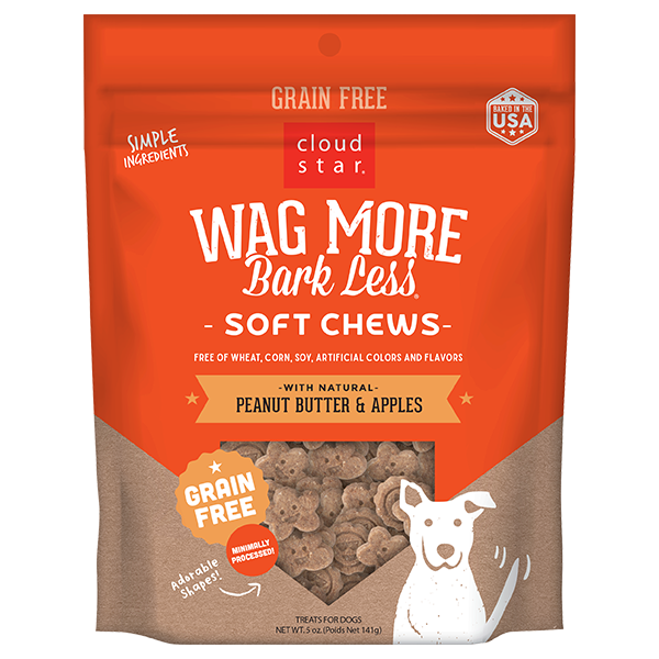 Orange bag of Cloud Star Wag More Bark Less soft dog chews with peanut butter and apples flavor, grain-free, featuring a cartoon dog illustration and a transparent window showing the treats inside.
