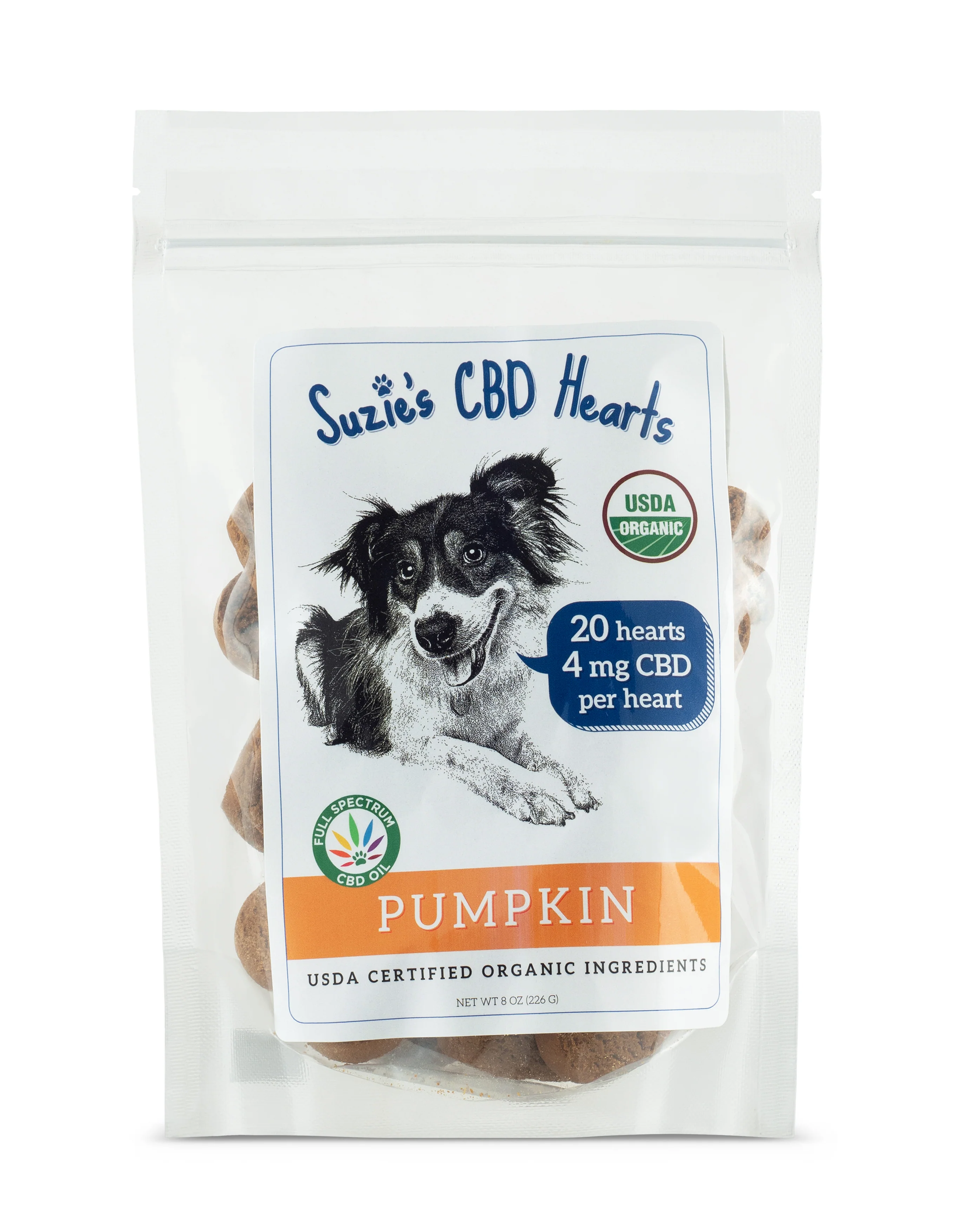 Packaging of Suzie's CBD Hearts dog treats, labeled as USDA organic, with a drawing of a happy dog and indicating it contains 20 hearts with 4 mg CBD each, flavored pumpkin.