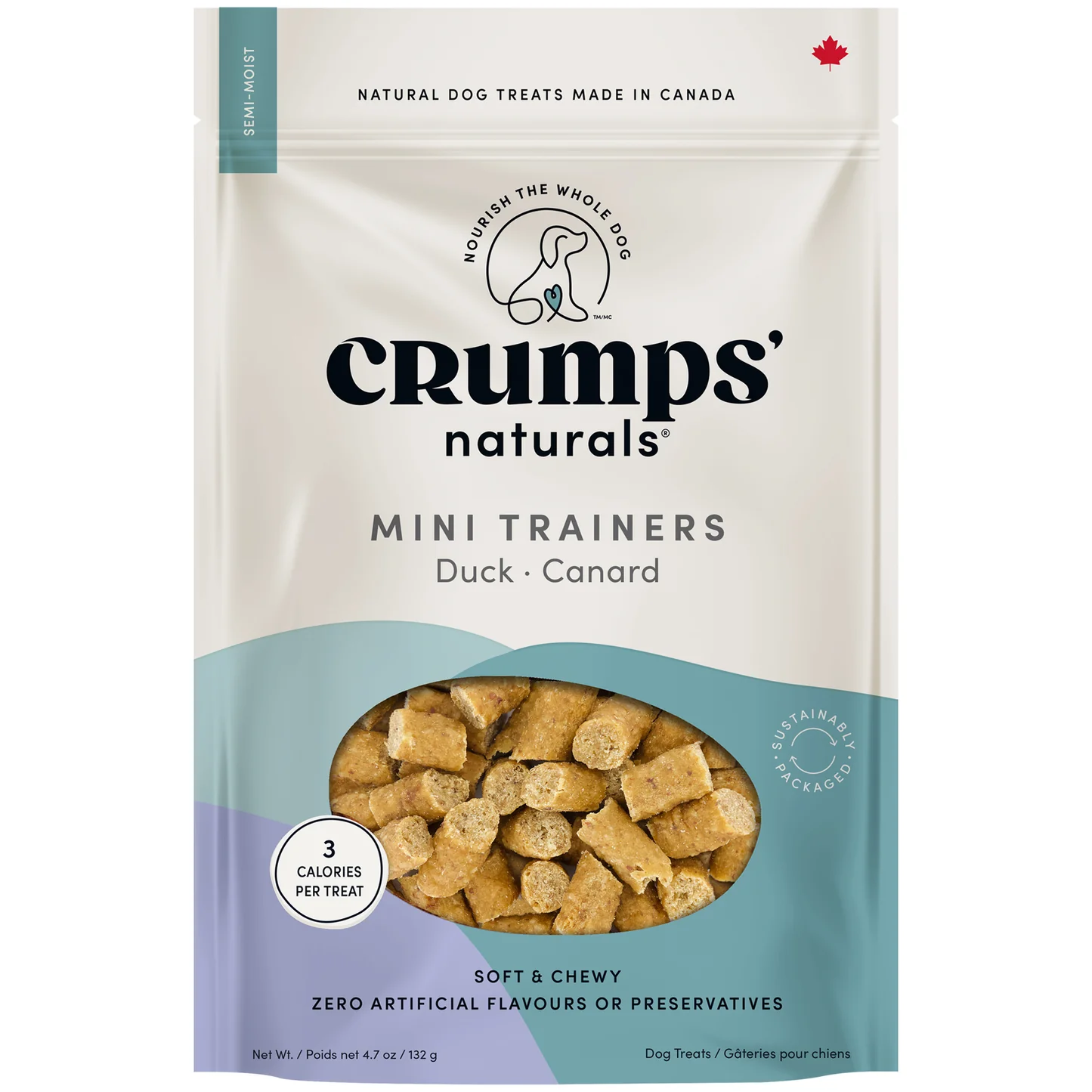 Package of Crumps Naturals Mini Trainers duck-flavored dog treats made in Canada, featuring a transparent window showing small, golden-brown dog treats inside. The packaging indicates zero artificial flavors or preservatives, 3 calories per treat, and is sustainably packaged.