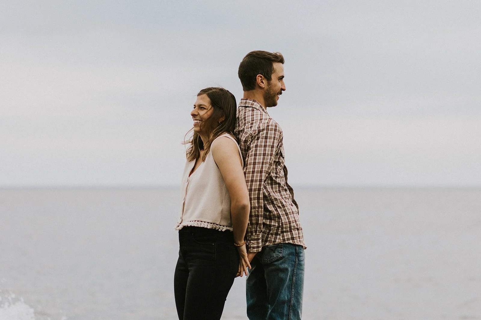 A couple pose for a photo at Black Rocks in Marquette Michigan