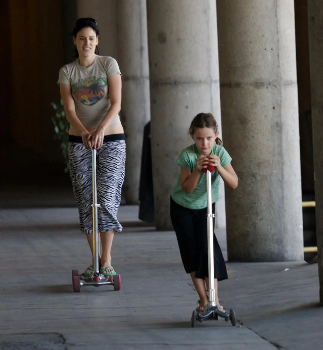 Eva Luna Ortiz and Laura Salwet ride scooters together in 2007.