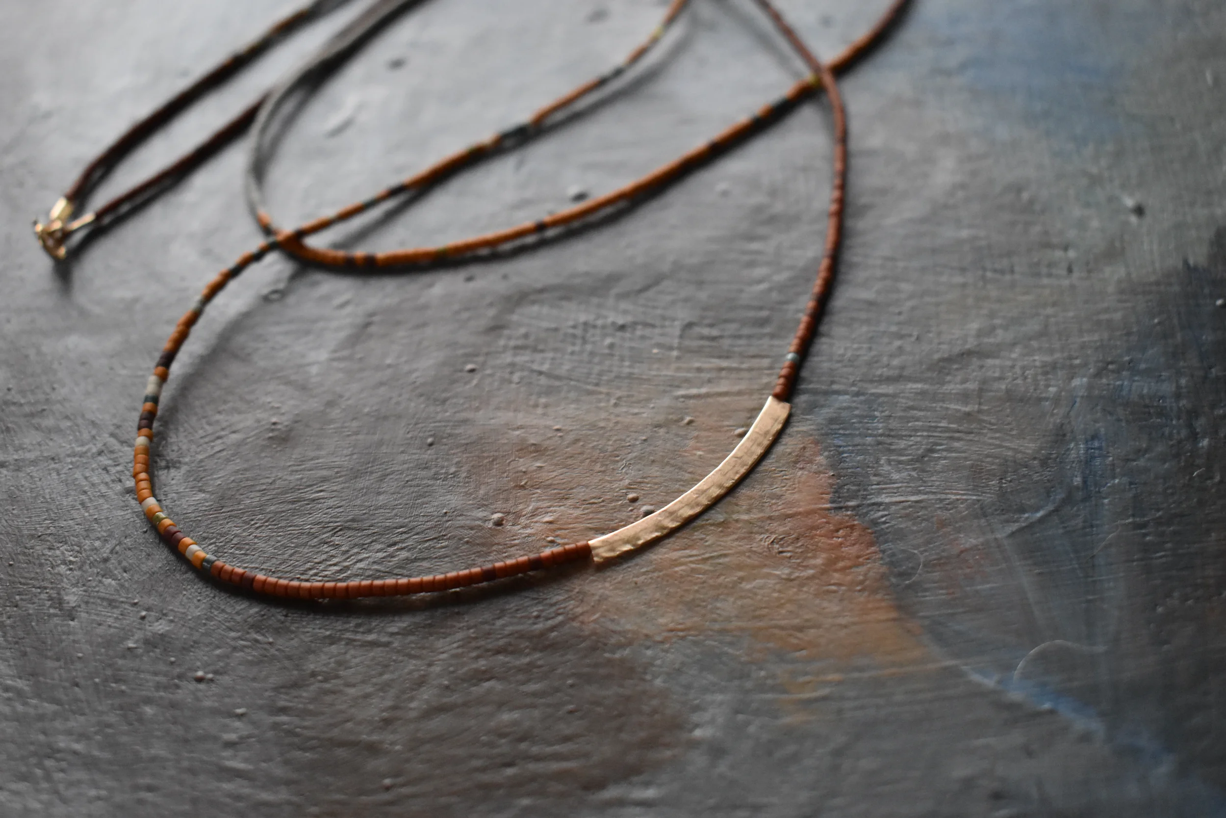 sand halo necklace 2.webp