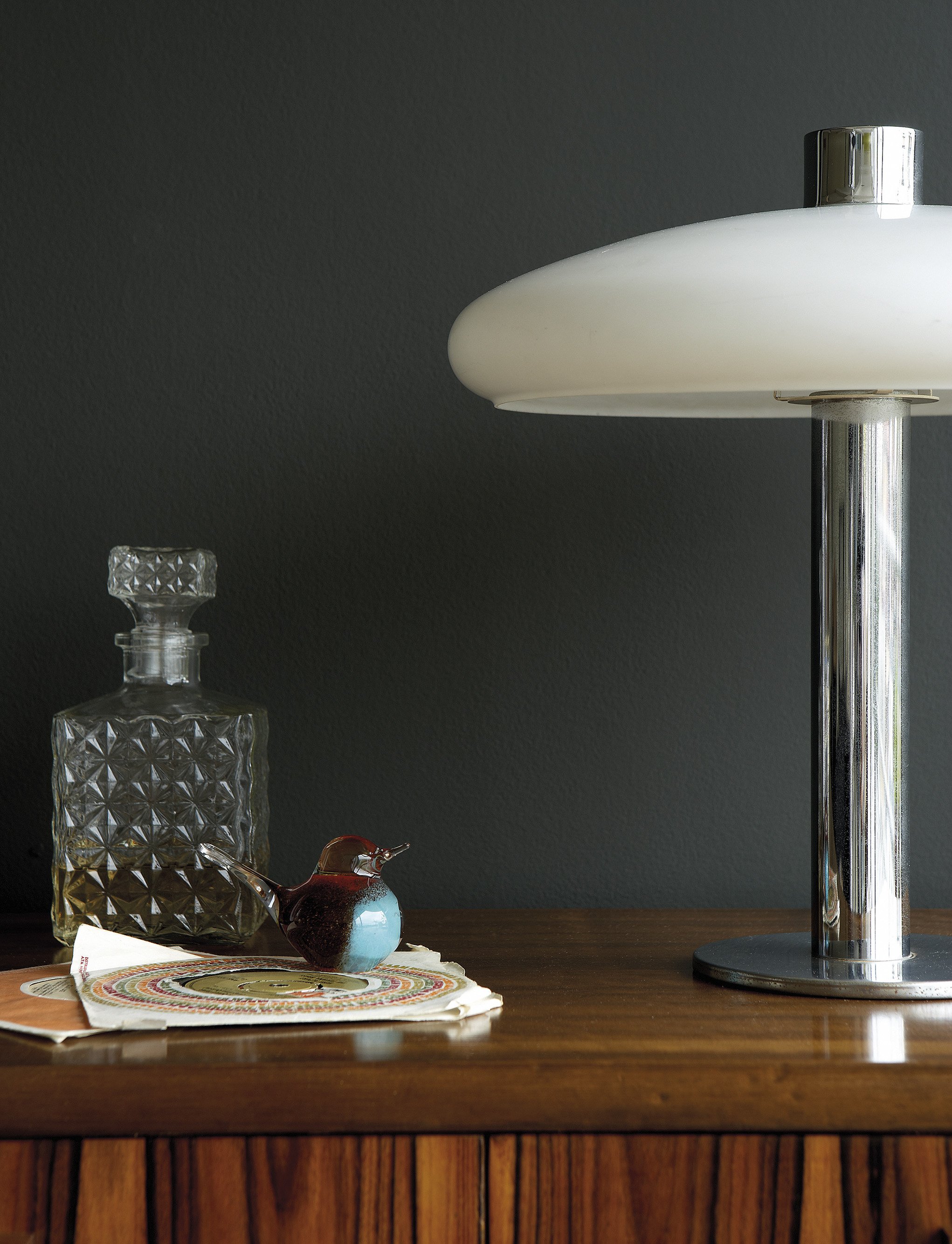 Little Greene Paint interwar colours - cocktail decanter on table with lamp