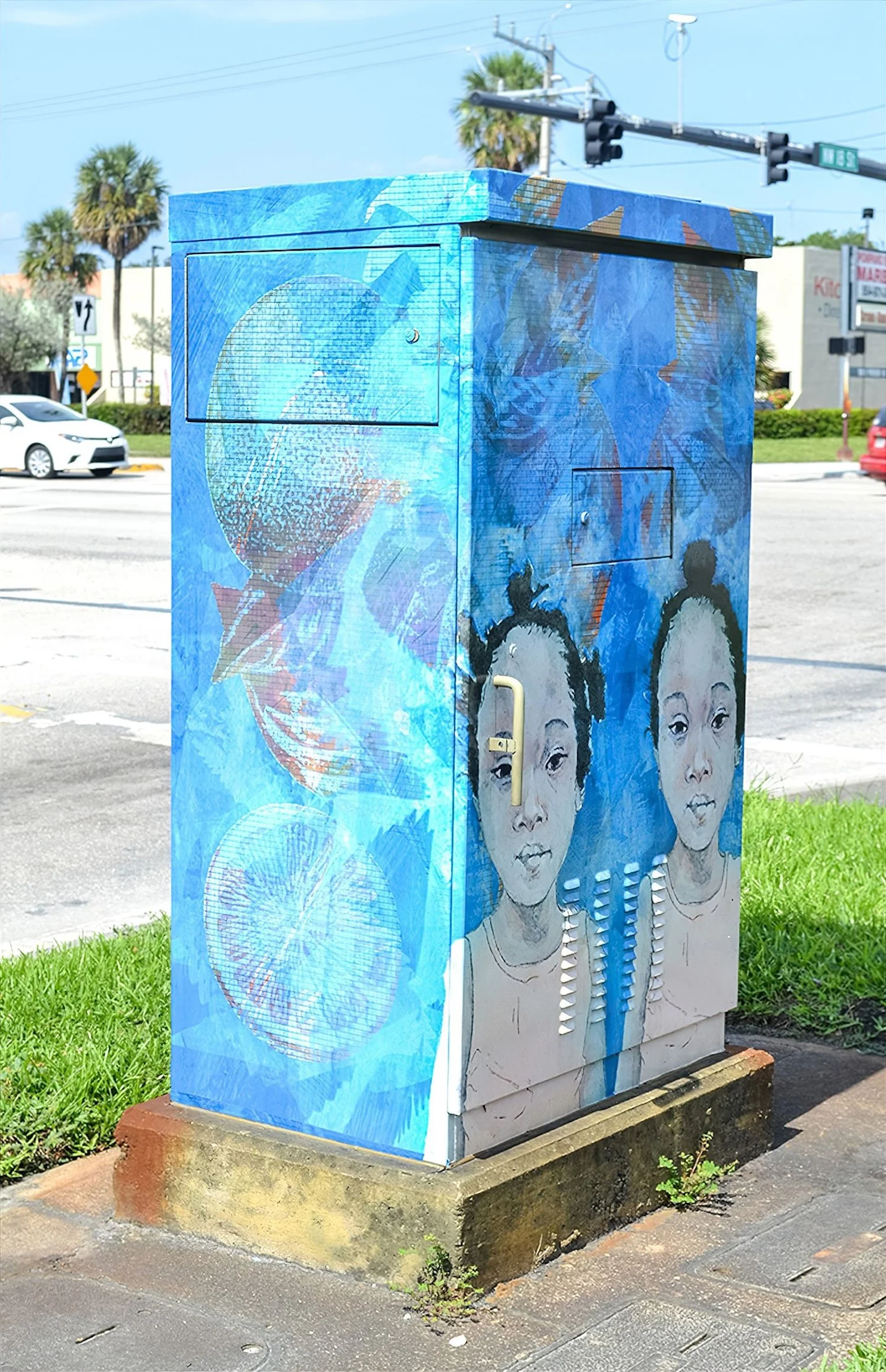 Detail: 'Sisters' design on traffic signal box