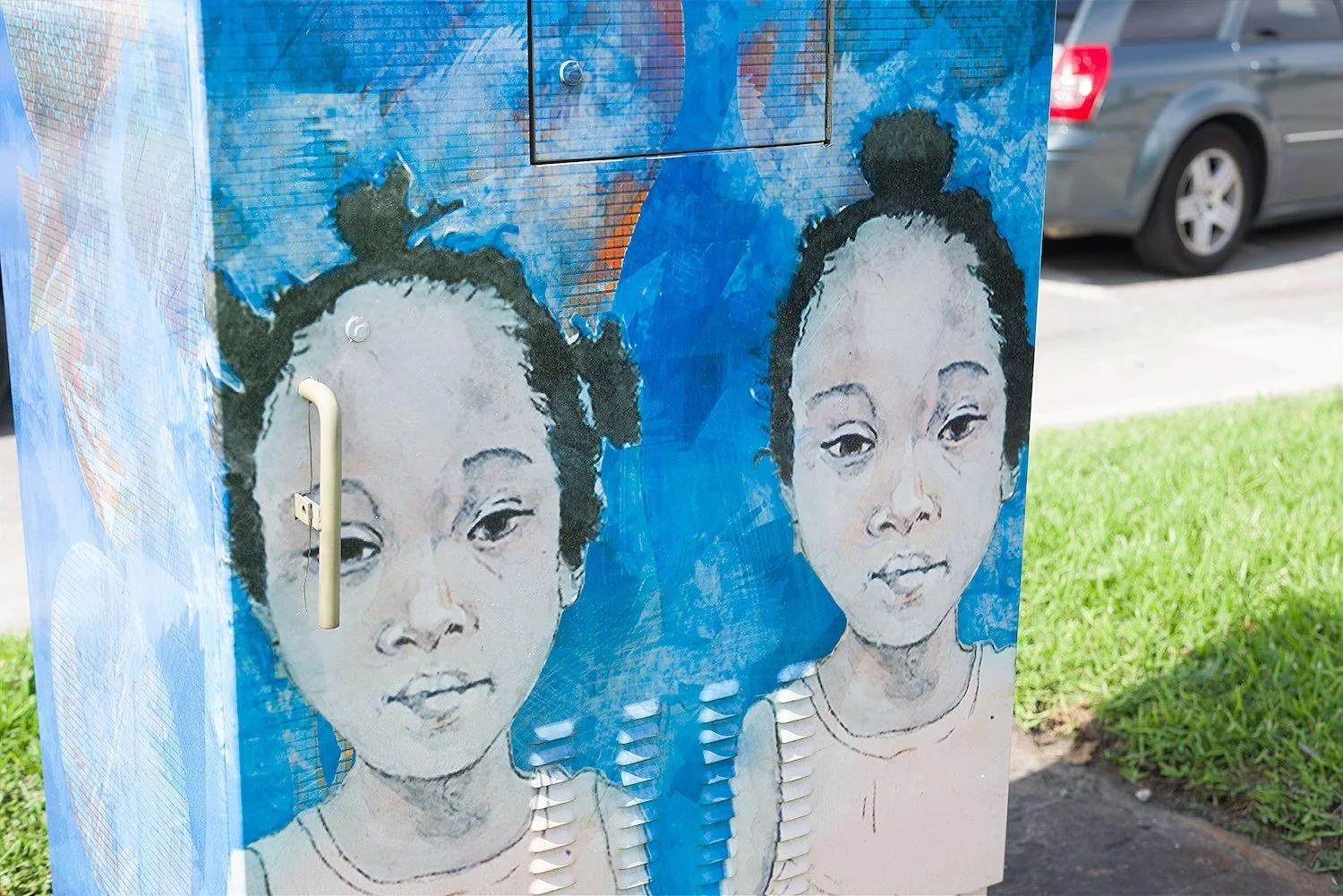 Detail: 'Sisters' design on traffic signal box