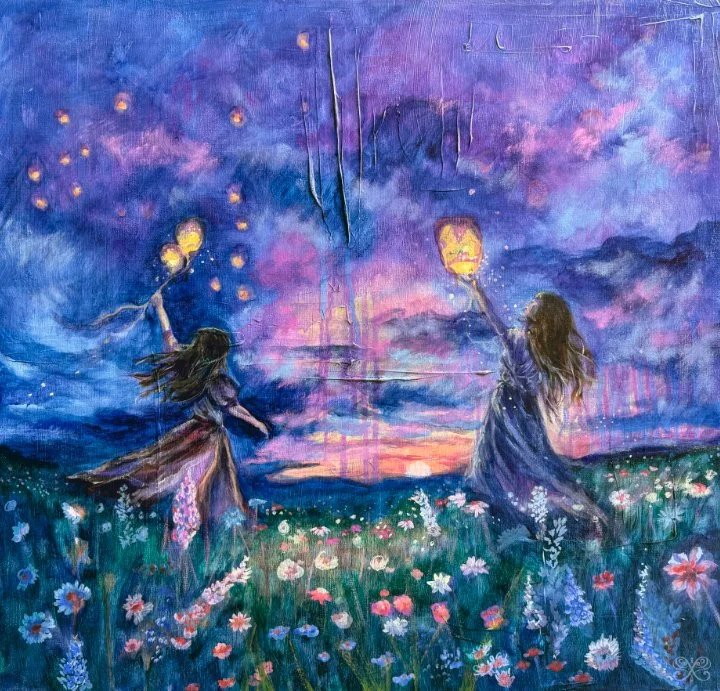 Two girls in a flower field at sunset, holding lanterns, with a dreamy sky and a bridge in the background.
