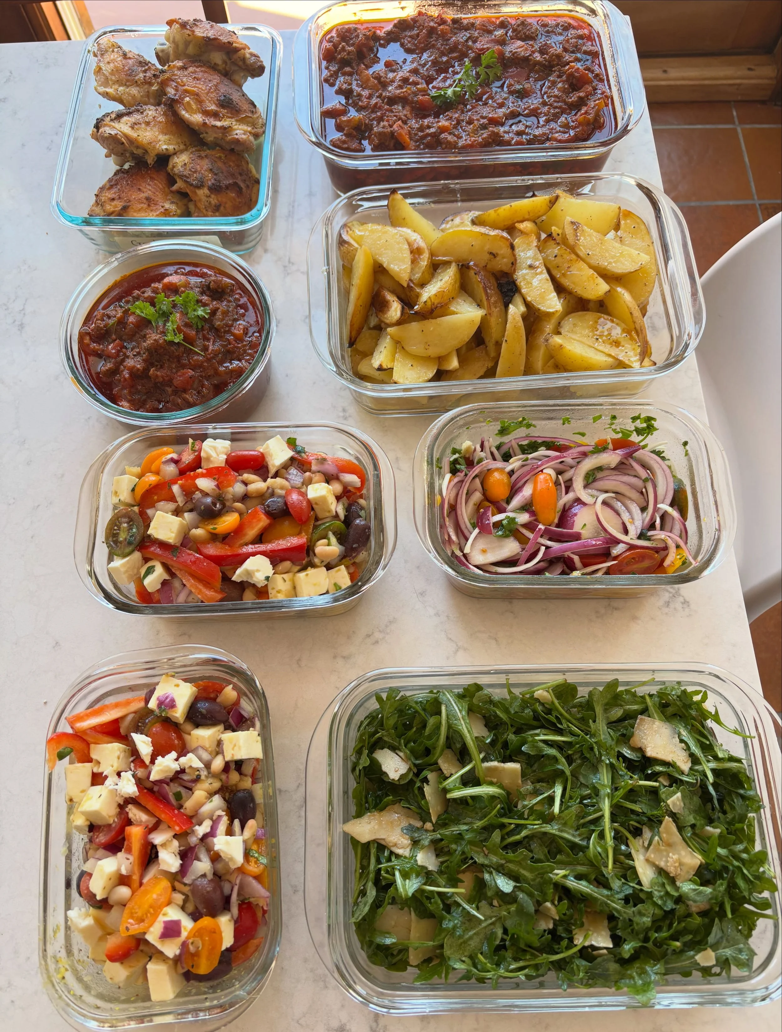 Things that I meal prepped for my client to make their week easier:

- Greek lemon potatoes
- roasted Greek chicken thighs
- Italian bolognese sauce for pasta
- marinated Greek bean salad
- arugula salad with Parmesan shavings
- marinated tomato sala