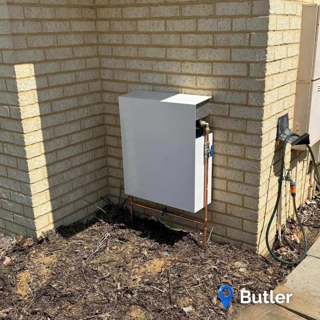 Pure₂O whole-house water filtration system installed at a Butler WA home with outdoor enclosure and premium 3-stage filtration.