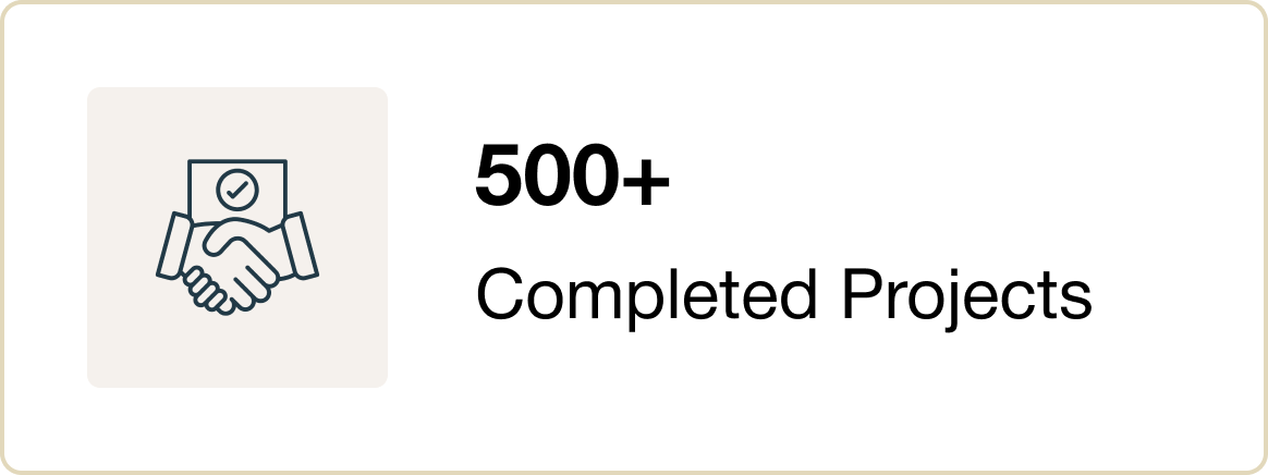 Icon of two hands shaking with a checkmark above, next to text '500+ Completed Projects'.
