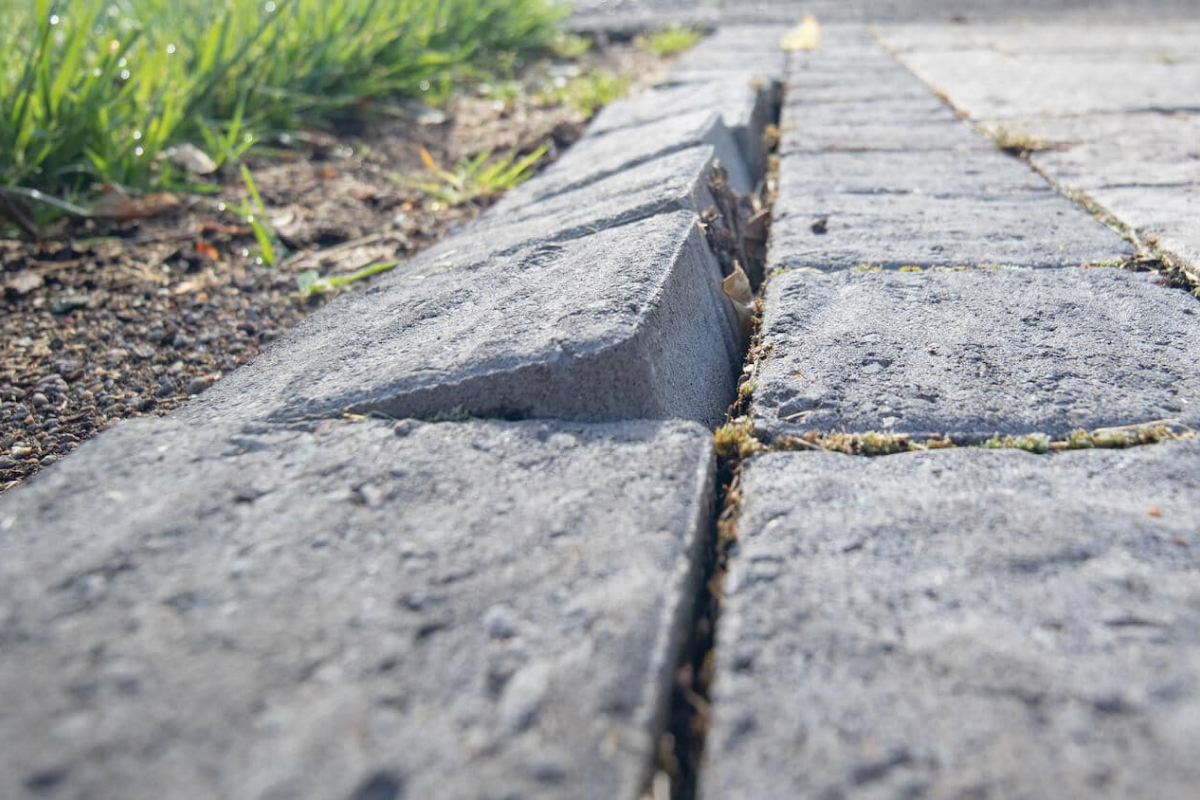Sinking pavers that need to be regraded