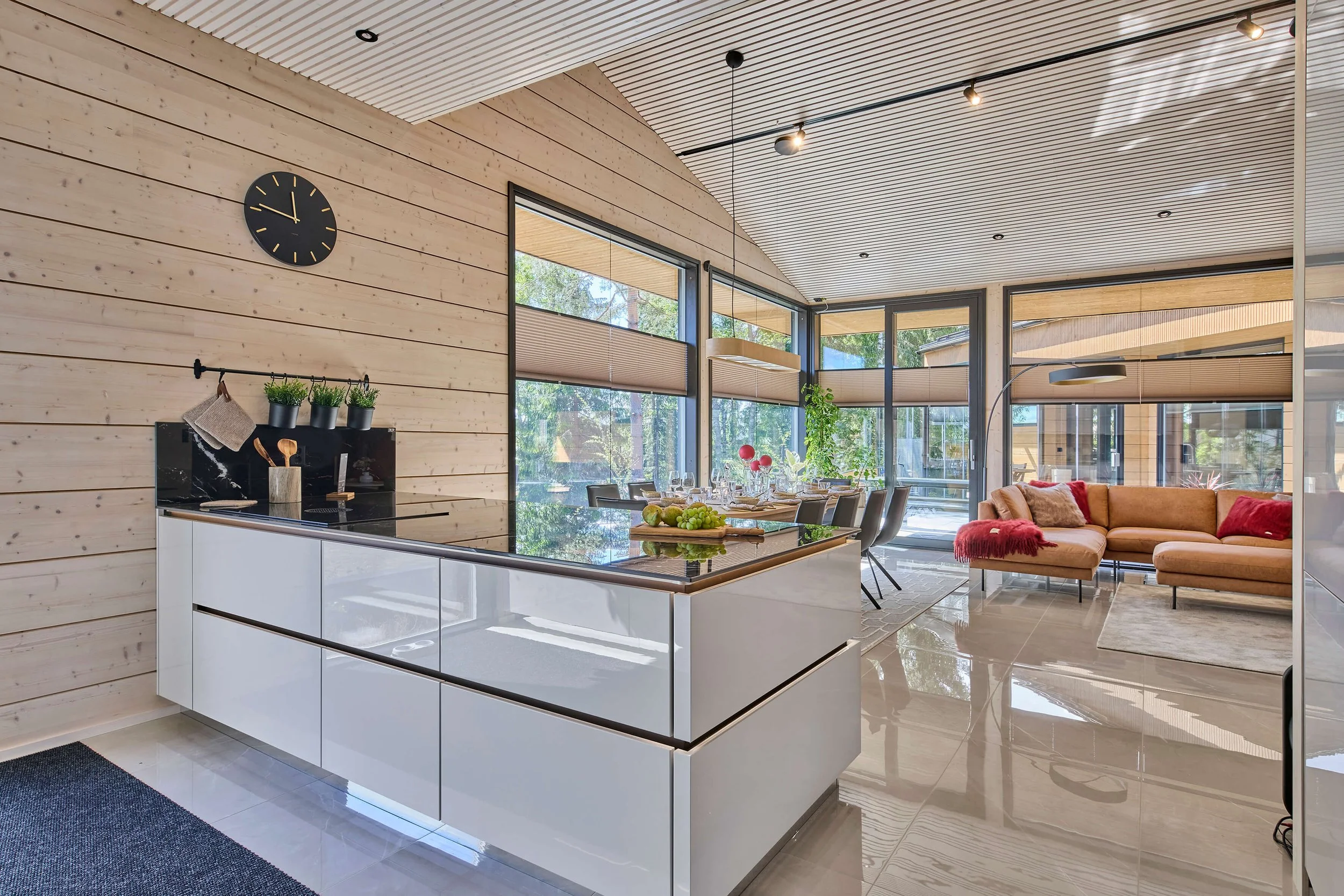 villa-heart-open-kitchen-log-cabin-dining-area-large-windows.jpg