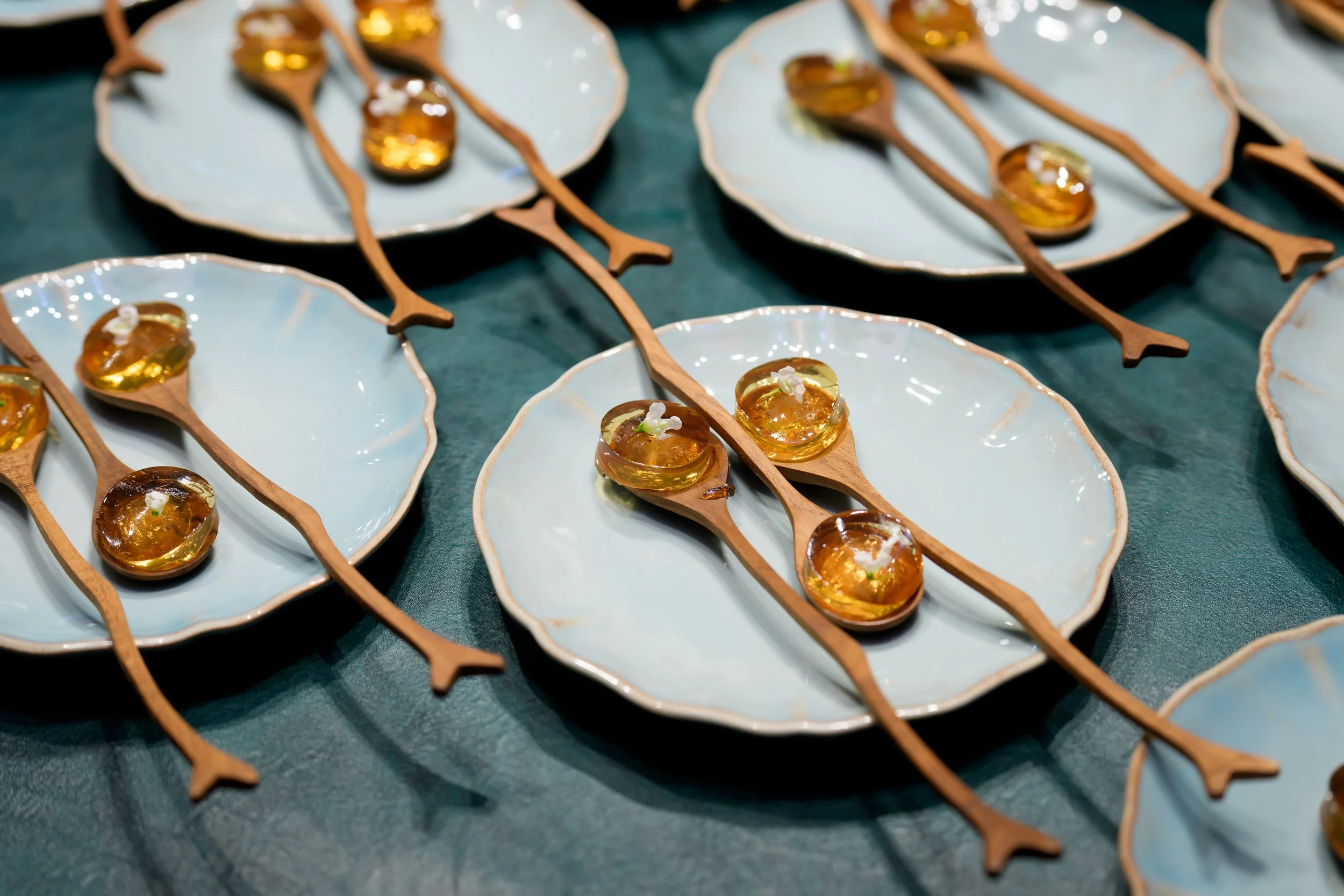 Premium curated canapés and bubbly complementing the evening's conversation