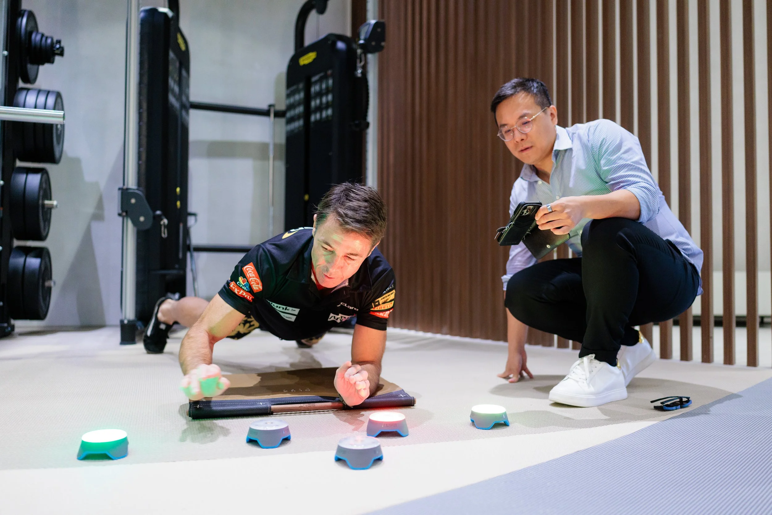 YPO Singapore guests testing reaction time in Elyx's Performance Area