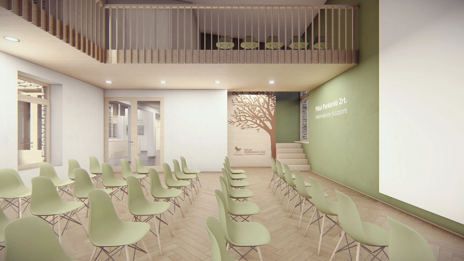 Interior of a modern lobby with rows of green chairs, large windows, a green wall with white text, and a staircase leading up to a mezzanine area with additional chairs.