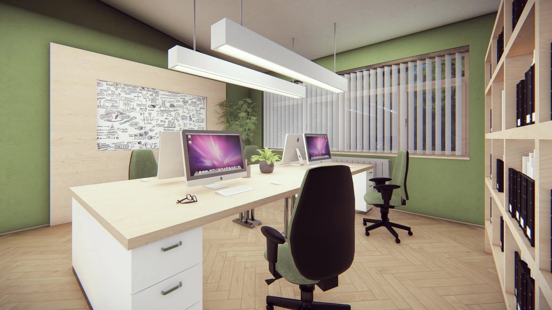 Office room with a large white table, three desktop computers, black and green office chairs, a whiteboard with sketches, a plant, and tall shelving with black binders. Green walls and window blinds are visible.