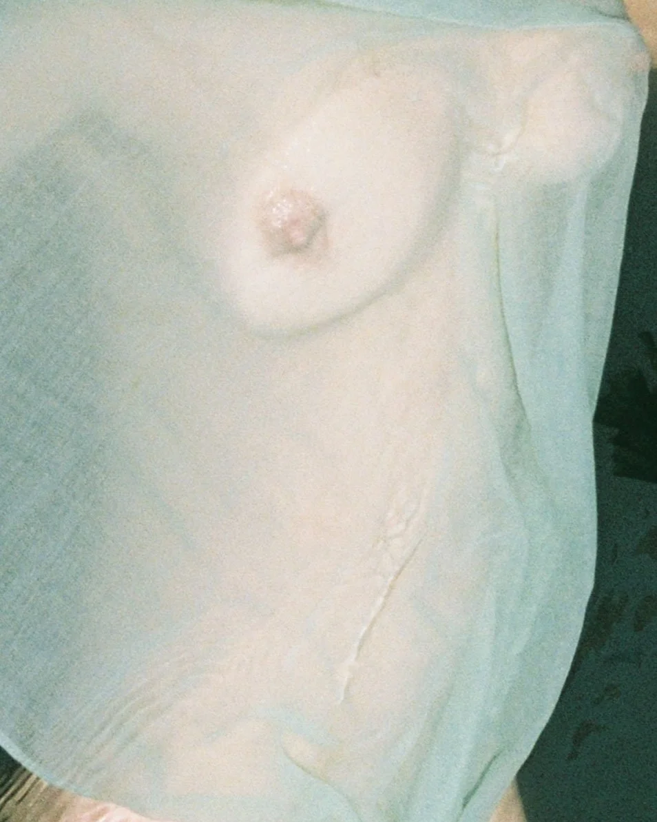 Close-up of a torso in the sea.
