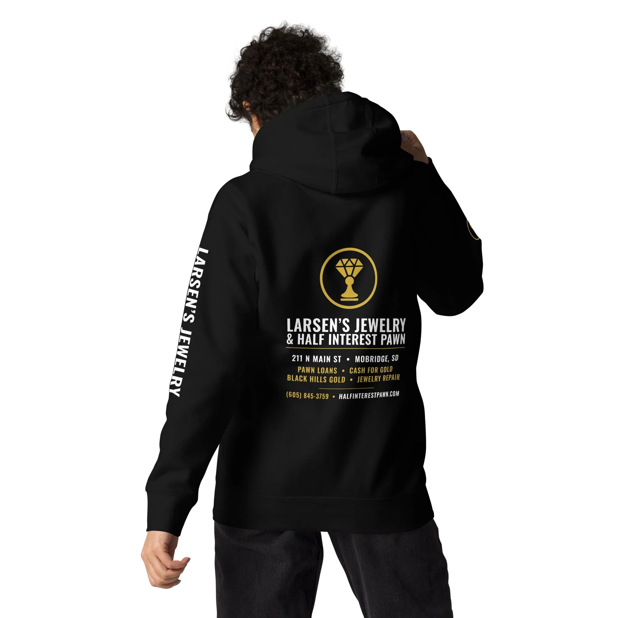Back of the Larsen's Jewelry & Half Interest Pawn hoodie in black with the gold Main Street sign lockup, Mobridge SD