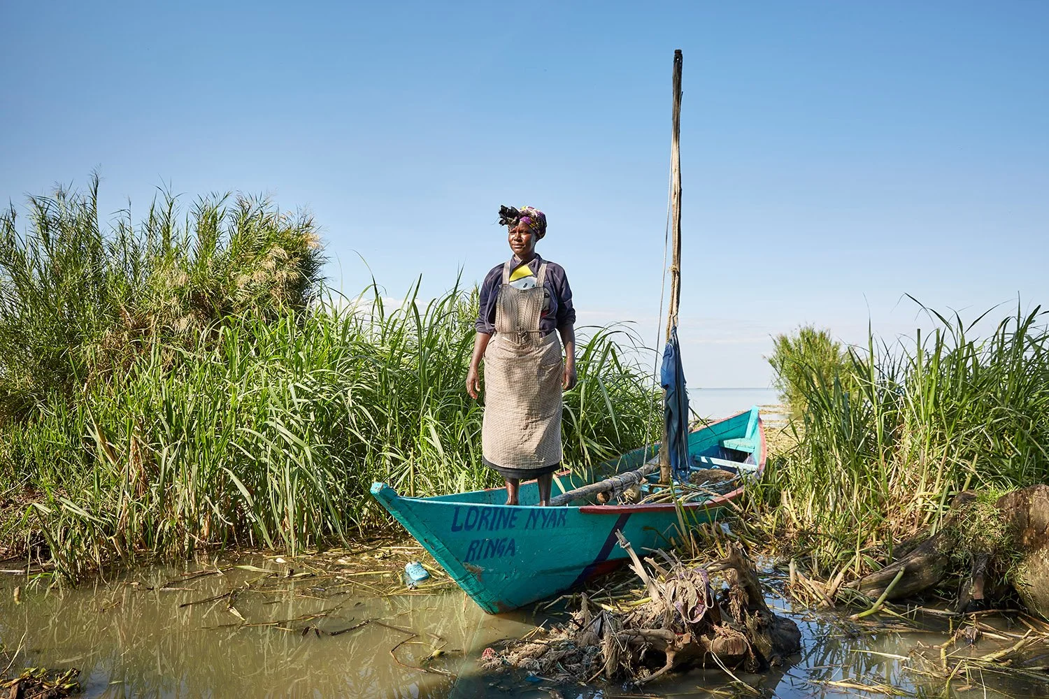 Lorine, member of the No Sex For Fish cooperative, stands in her boat on Nduru Beach, Kisumu, Kenya, 2019.
Lorine has one of the few No Sex For Fish boats that are still functioning in Nduru Beach.