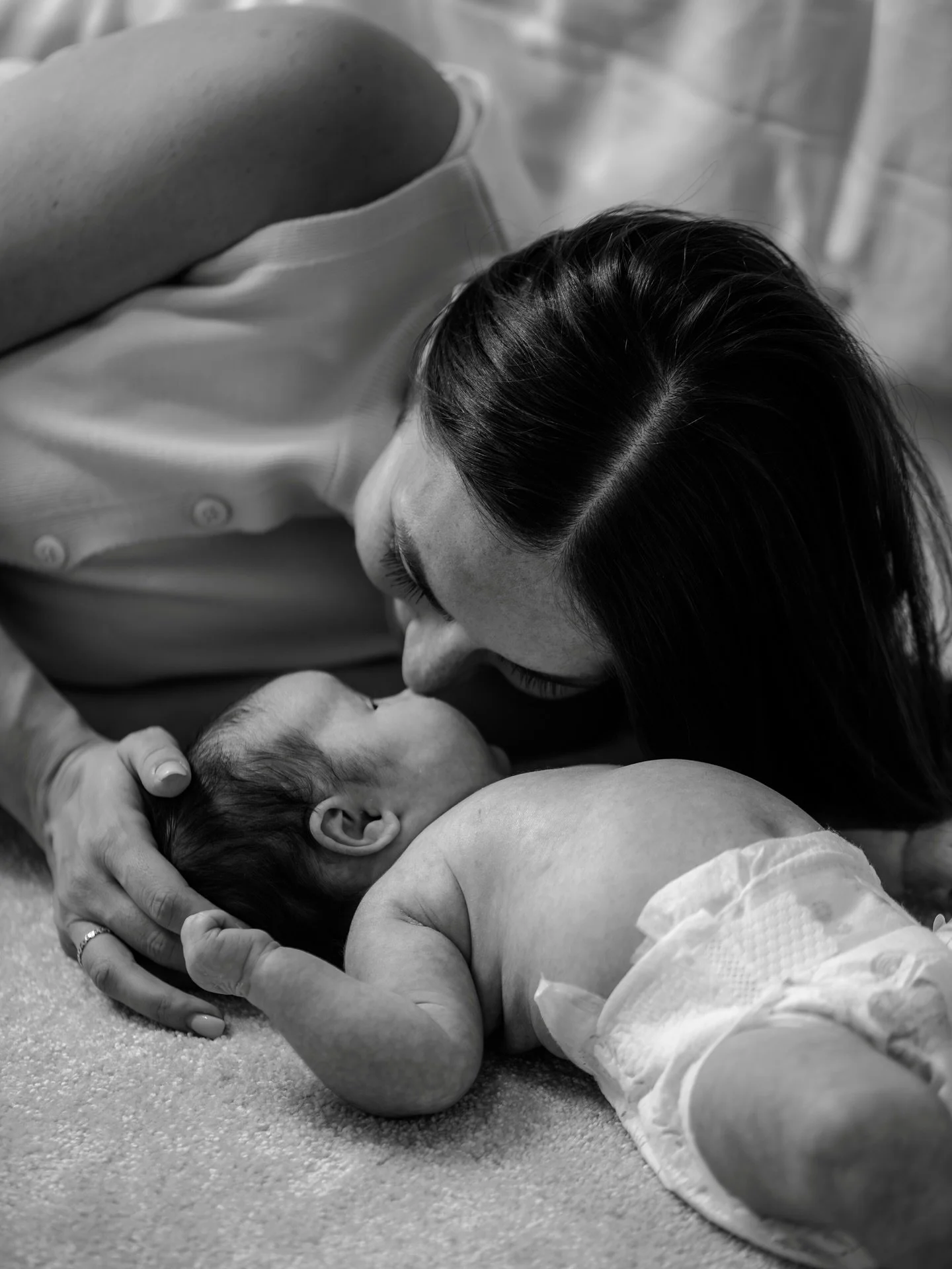 There&rsquo;s something so beautifully simple about these quiet, in-between moments.

Little Nancie, safe in her mum&rsquo;s hands - the soft stretch of tiny fingers, the curl of her toes, the way her mum leans in without even thinking. This is what 