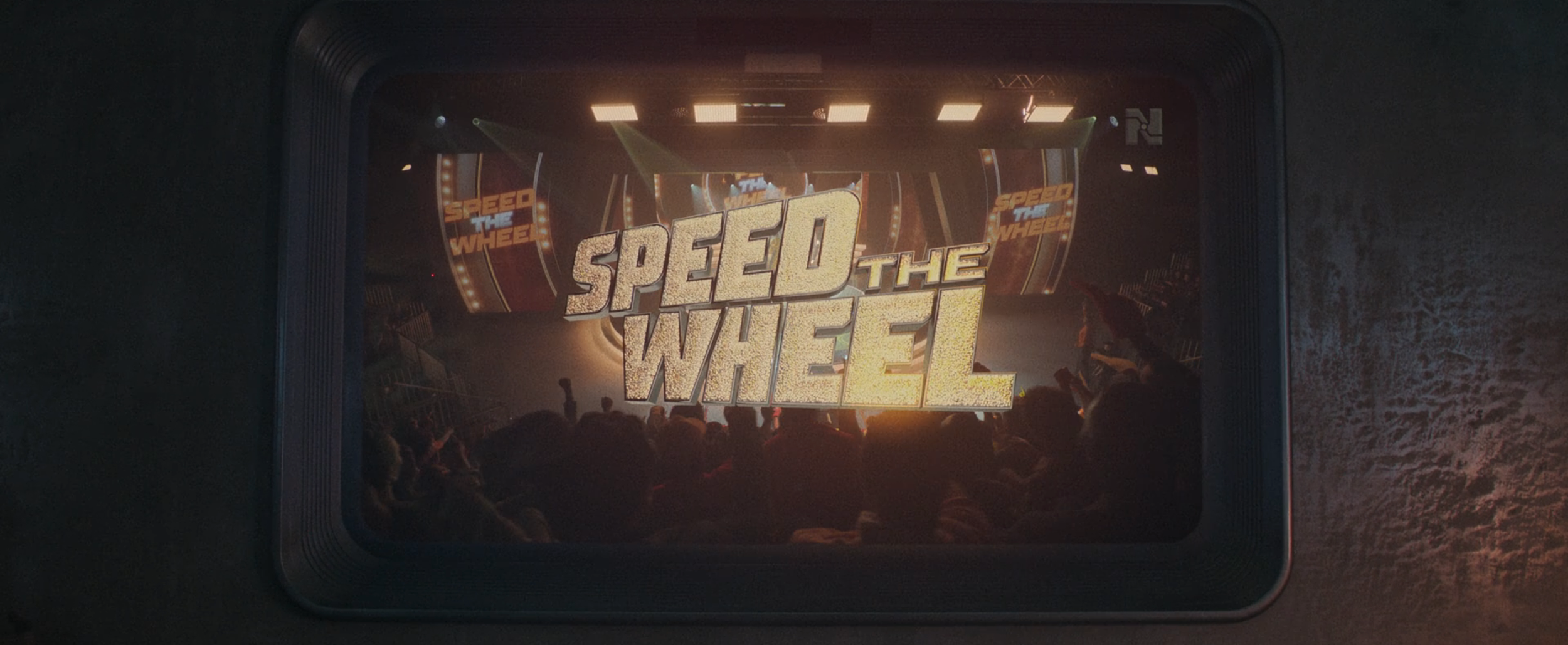 Speed the Wheel gameshow logo – designed by myself and applied to costume, game show set, and animated for screen GFX by 2Fresh. 