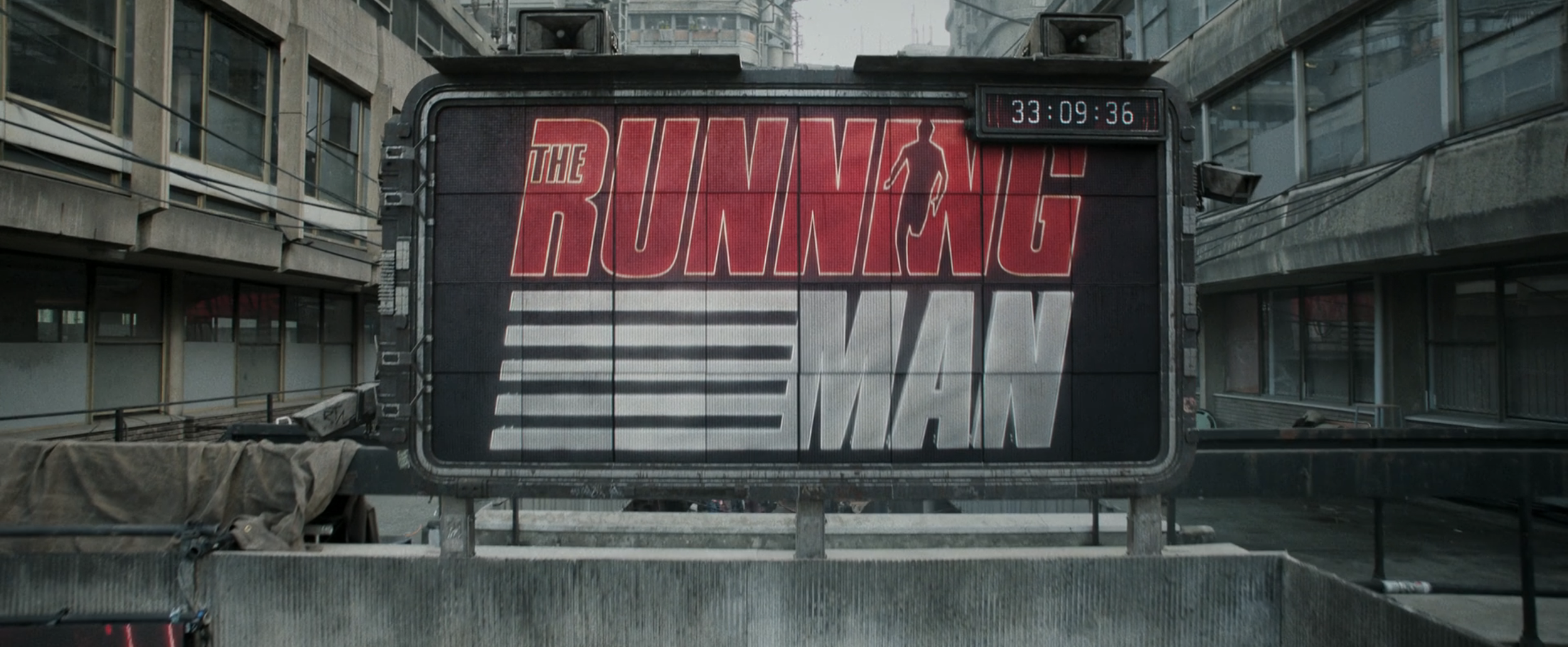 The Running Man logo – used as the omnipresent in-universe gameshow logo, and as the Production logo for all marketing globally. 