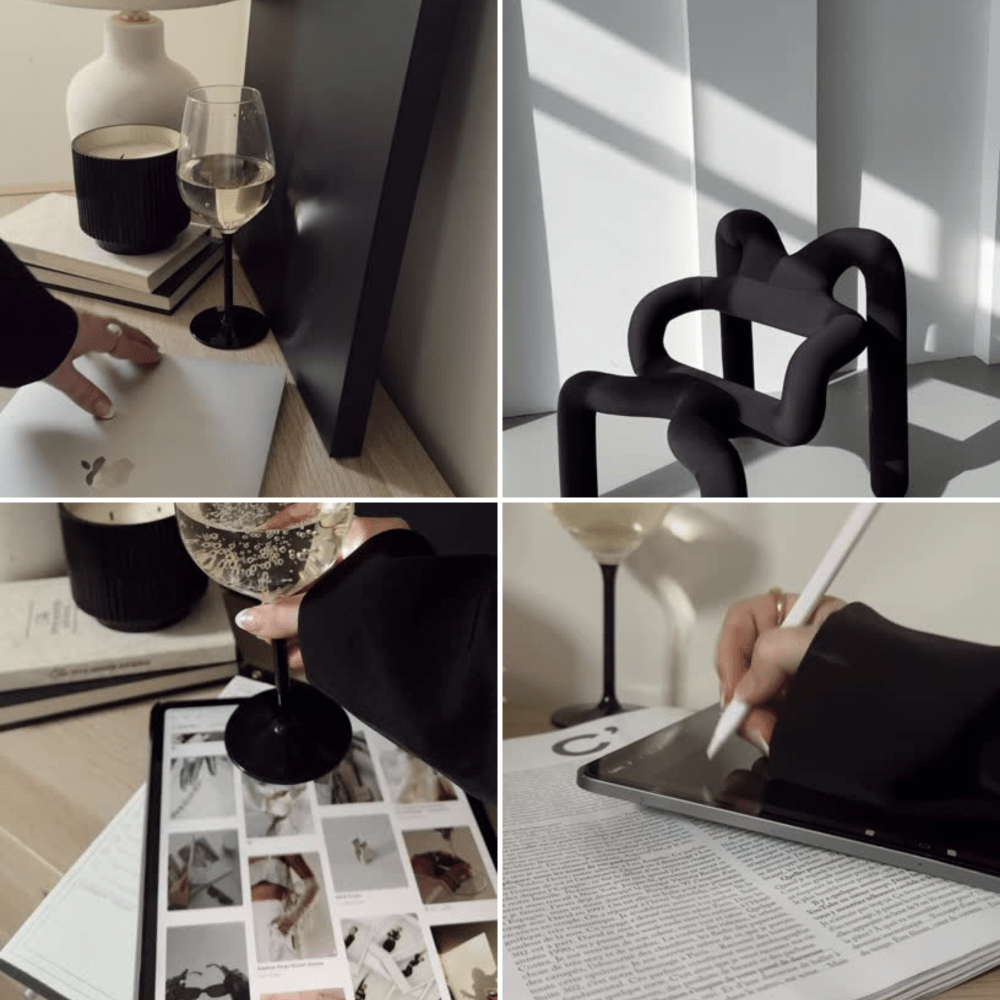 A collage of four images showing a modern workspace. The top left features a hand pointing to a tablet on a light wooden table, with a glass of water, a black cup, a white vase, and some books. The top right displays a black abstract chair against a white wall with striped shadows. The bottom left captures a person holding a glass of bubbly drink over a magazine on the table. The bottom right shows a hand writing on a digital tablet with a stylus, next to a glass of white wine and a white vase.