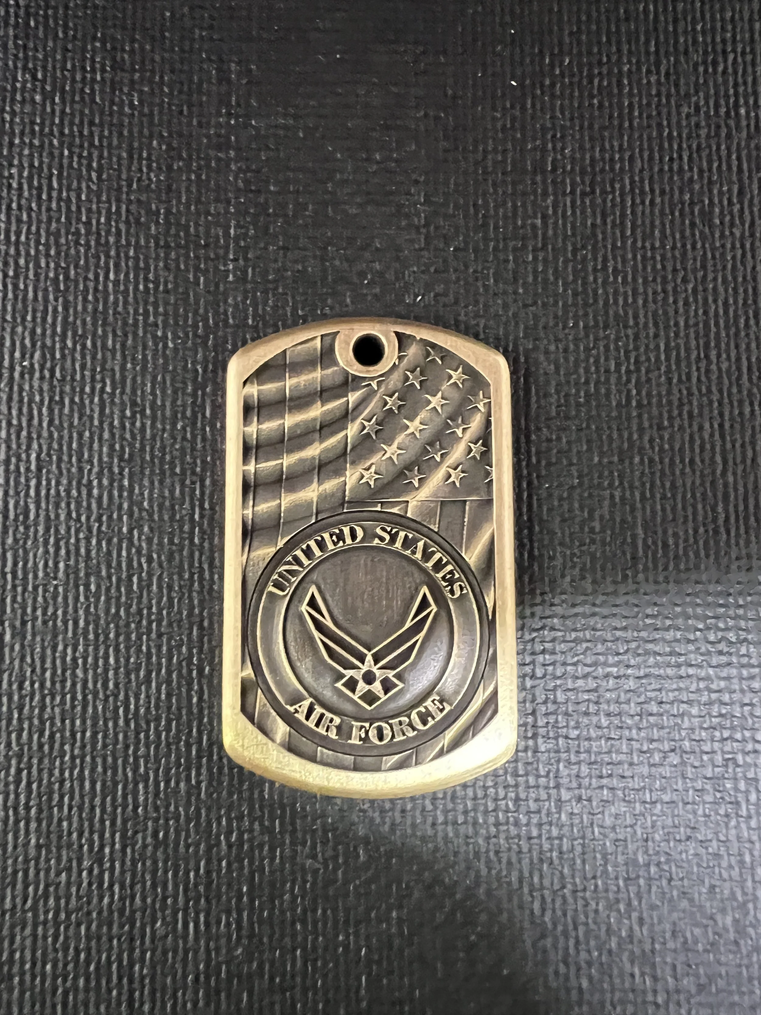 3D engraved military dog tag featuring United States Armed Forces branch designs, available in brass and stainless steel with detailed laser engraving.