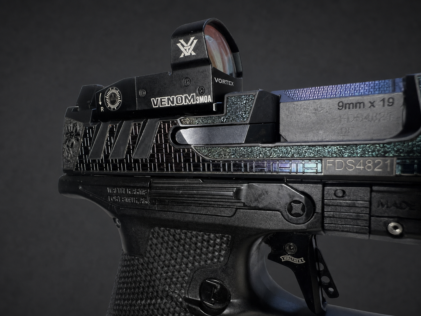 Detail of Vortex Venom optic, engraved geometric slide panels and iridescent laser-polish finish on Walther PDP Pro
