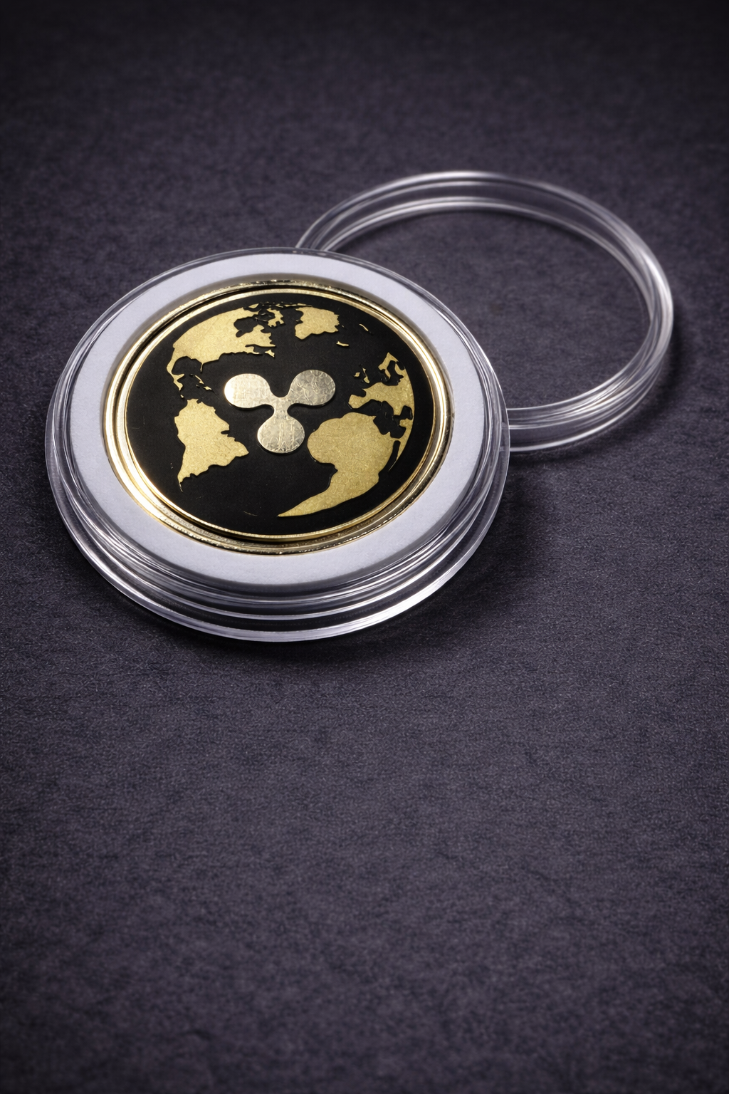 Blank brass challenge coins stacked and displayed on dark background, ready for custom engraving