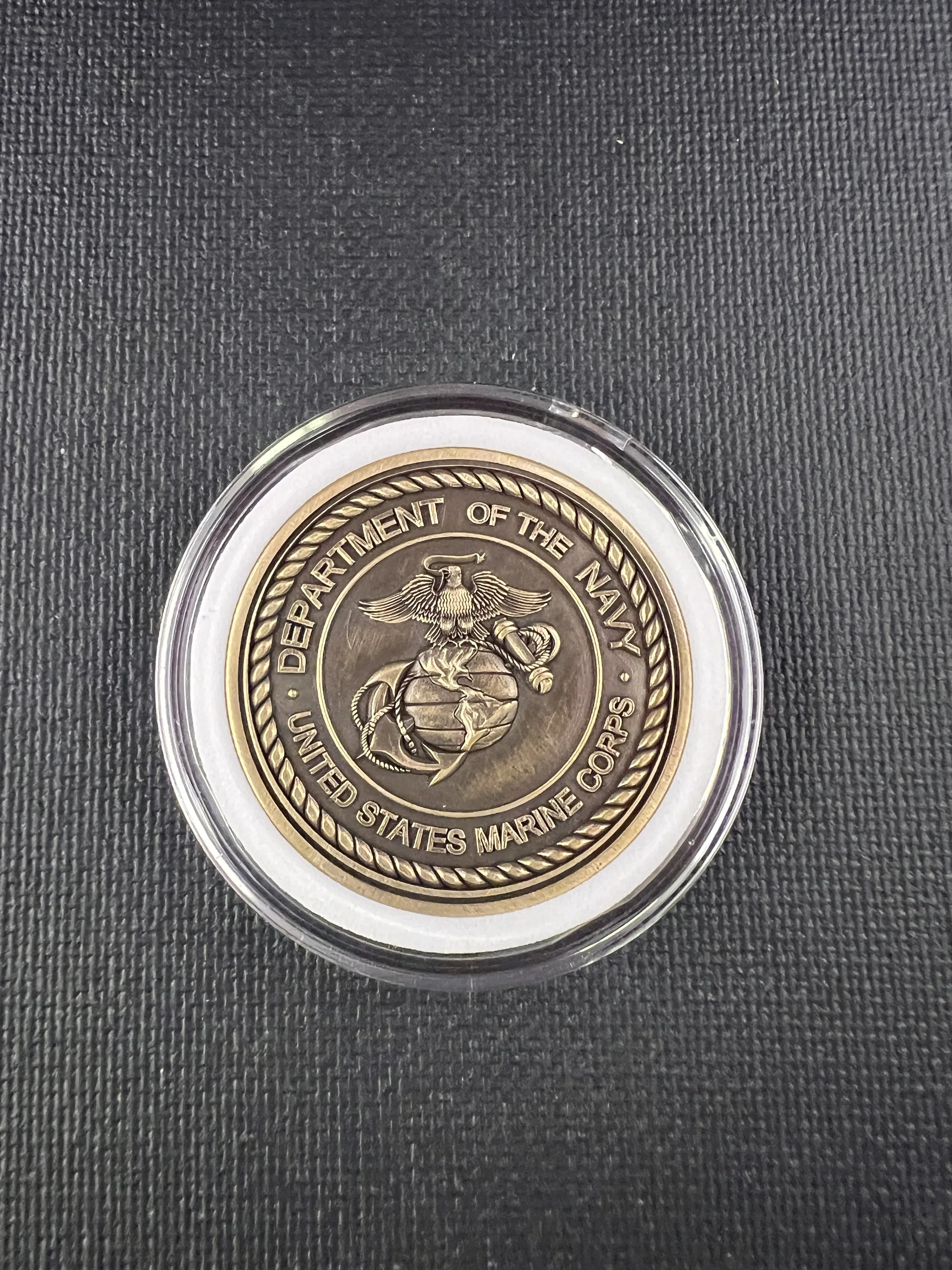 3D engraved military challenge coin featuring United States Marine Corps emblem, crafted in brass or stainless steel with detailed raised relief engraving.
