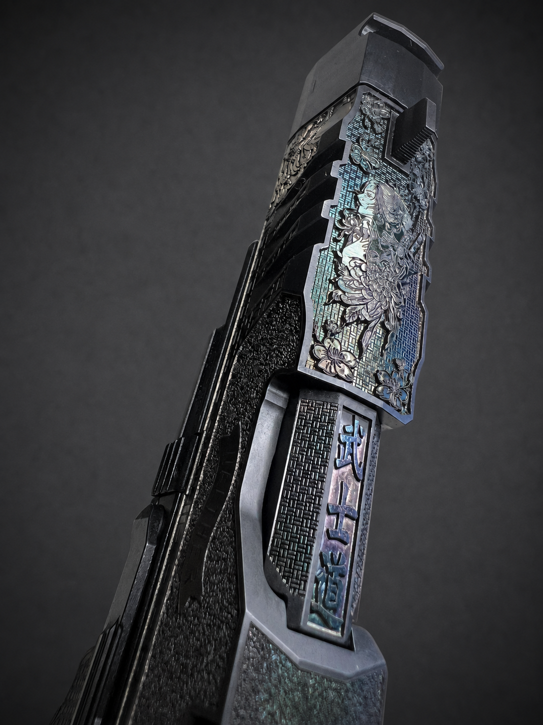 Rear-to-front top view of custom Walther PDP Pro showing engraved artwork, Japanese characters and color-shifting accents