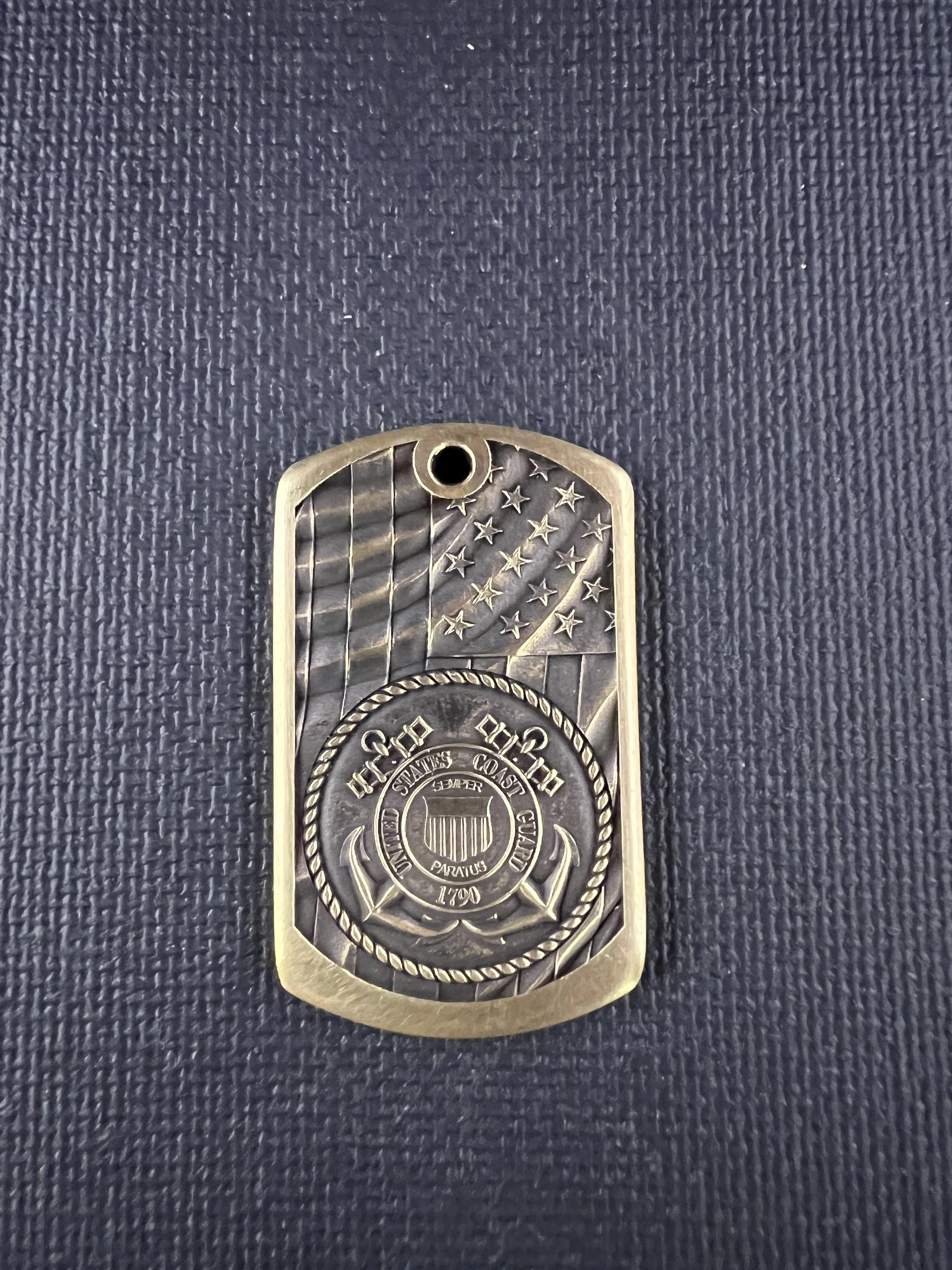 3D engraved military dog tag featuring United States Armed Forces branch designs, available in brass and stainless steel with detailed laser engraving.