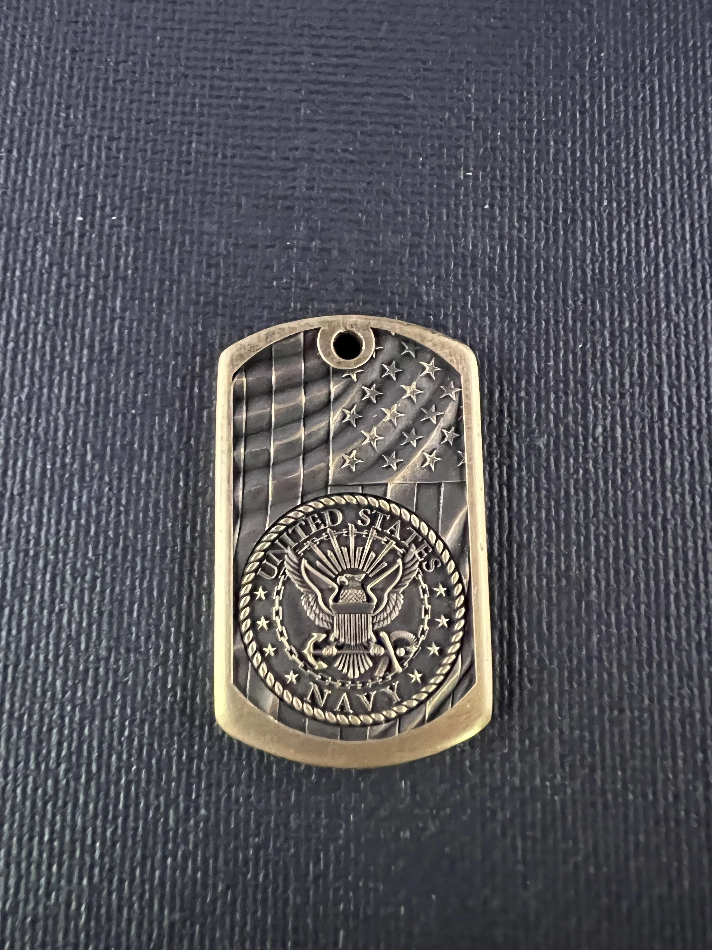 3D engraved military dog tag featuring United States Armed Forces branch designs, available in brass and stainless steel with detailed laser engraving.